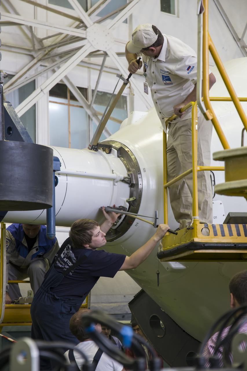 The Soyuz rocket and Soyuz TMA-14M spacecraft is assembled at Building 112 at the Baikonur Cosmodrome on Monday, Sept. 22, 2014, in Baikonur, Kazakhstan. Launch of the Soyuz is scheduled for Sept. 26 and will send Expedition 41 Soyuz Commander Alexander Samokutyaev of the Russian Federal Space Agency (Roscosmos), Flight Engineer Barry Wilmore of NASA, and Flight Engineer Elena Serova of Roscosmos to the International Space Station for a five and a half month stay. Photo Credit: (NASA/Victor Zelentsov)