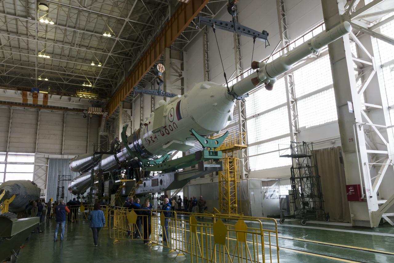 The Soyuz rocket and Soyuz TMA-14M spacecraft is assembled at Building 112 at the Baikonur Cosmodrome on Monday, Sept. 22, 2014, in Baikonur, Kazakhstan. Launch of the Soyuz is scheduled for Sept. 26 and will send Expedition 41 Soyuz Commander Alexander Samokutyaev of the Russian Federal Space Agency (Roscosmos), Flight Engineer Barry Wilmore of NASA, and Flight Engineer Elena Serova of Roscosmos to the International Space Station for a five and a half month stay. Photo Credit: (NASA/Victor Zelentsov)