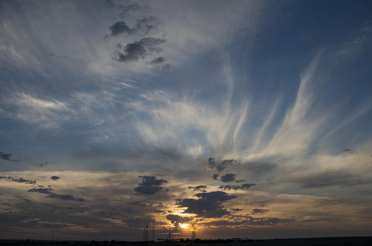 The sun rises behind the Soyuz launch pad as the Soyuz TMA-14M spacecraft is rolled out by train to the launch pad at the Baikonur Cosmodrome, Kazakhstan, Sept. 23, 2014. Launch of the Soyuz rocket is scheduled for Sept. 26 and will carry Expedition 41 Soyuz Commander Alexander Samokutyaev of the Russian Federal Space Agency (Roscosmos), Flight Engineer Barry Wilmore of NASA, and Flight Engineer Elena Serova of Roscosmos into orbit to begin their five and a half month mission on the International Space Station. Photo Credit: (NASA/Joel Kowsky)