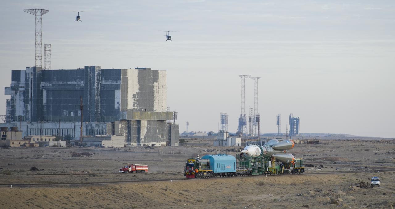 The Soyuz TMA-14M spacecraft is rolled out to the launch pad by train on Tuesday, Sept. 23, 2014 at the Baikonur Cosmodrome in Kazakhstan.  Launch of the Soyuz rocket is scheduled for Sept. 26 and will carry Expedition 41 Soyuz Commander Alexander Samokutyaev of the Russian Federal Space Agency (Roscosmos), Flight Engineer Barry Wilmore of NASA, and Flight Engineer Elena Serova of Roscosmos into orbit to begin their five and a half month mission on the International Space Station. Photo Credit: (NASA/Joel Kowsky)