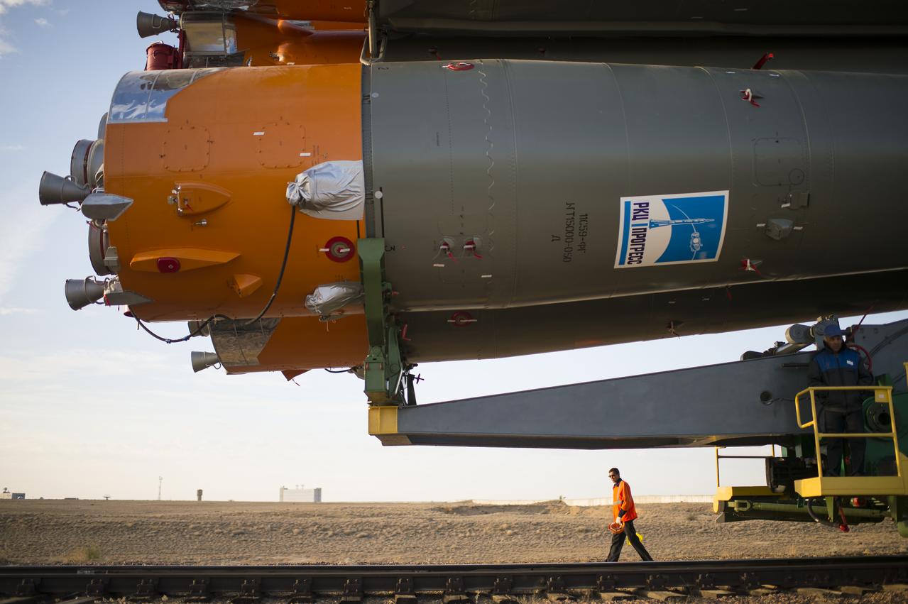 The Soyuz TMA-14M spacecraft is rolled out to the launch pad by train on Tuesday, Sept. 23, 2014 at the Baikonur Cosmodrome in Kazakhstan.  Launch of the Soyuz rocket is scheduled for Sept. 26 and will carry Expedition 41 Soyuz Commander Alexander Samokutyaev of the Russian Federal Space Agency (Roscosmos), Flight Engineer Barry Wilmore of NASA, and Flight Engineer Elena Serova of Roscosmos into orbit to begin their five and a half month mission on the International Space Station. Photo Credit: (NASA/Joel Kowsky)