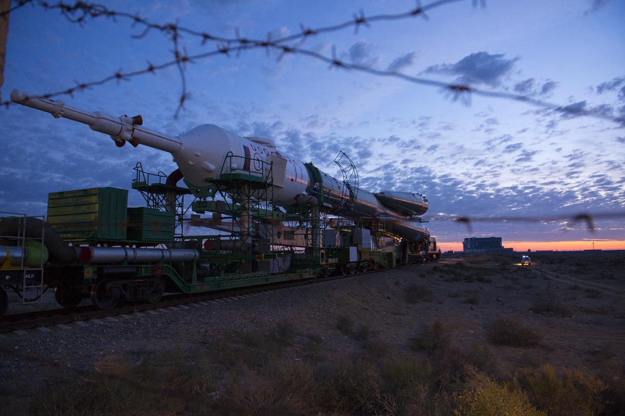 The Soyuz TMA-14M spacecraft is rolled out to the launch pad by train on Tuesday, Sept. 23, 2014 at the Baikonur Cosmodrome in Kazakhstan.  Launch of the Soyuz rocket is scheduled for Sept. 26 and will carry Expedition 41 Soyuz Commander Alexander Samokutyaev of the Russian Federal Space Agency (Roscosmos), Flight Engineer Barry Wilmore of NASA, and Flight Engineer Elena Serova of Roscosmos into orbit to begin their five and a half month mission on the International Space Station. Photo Credit: (NASA/Aubrey Gemignani)