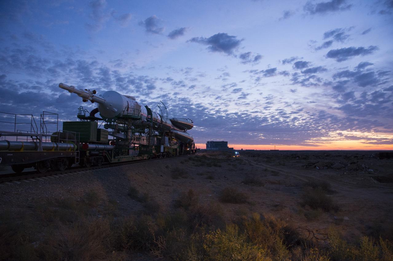 The Soyuz TMA-14M spacecraft is rolled out to the launch pad by train on Tuesday, Sept. 23, 2014 at the Baikonur Cosmodrome in Kazakhstan.  Launch of the Soyuz rocket is scheduled for Sept. 26 and will carry Expedition 41 Soyuz Commander Alexander Samokutyaev of the Russian Federal Space Agency (Roscosmos), Flight Engineer Barry Wilmore of NASA, and Flight Engineer Elena Serova of Roscosmos into orbit to begin their five and a half month mission on the International Space Station. Photo Credit: (NASA/Aubrey Gemignani)