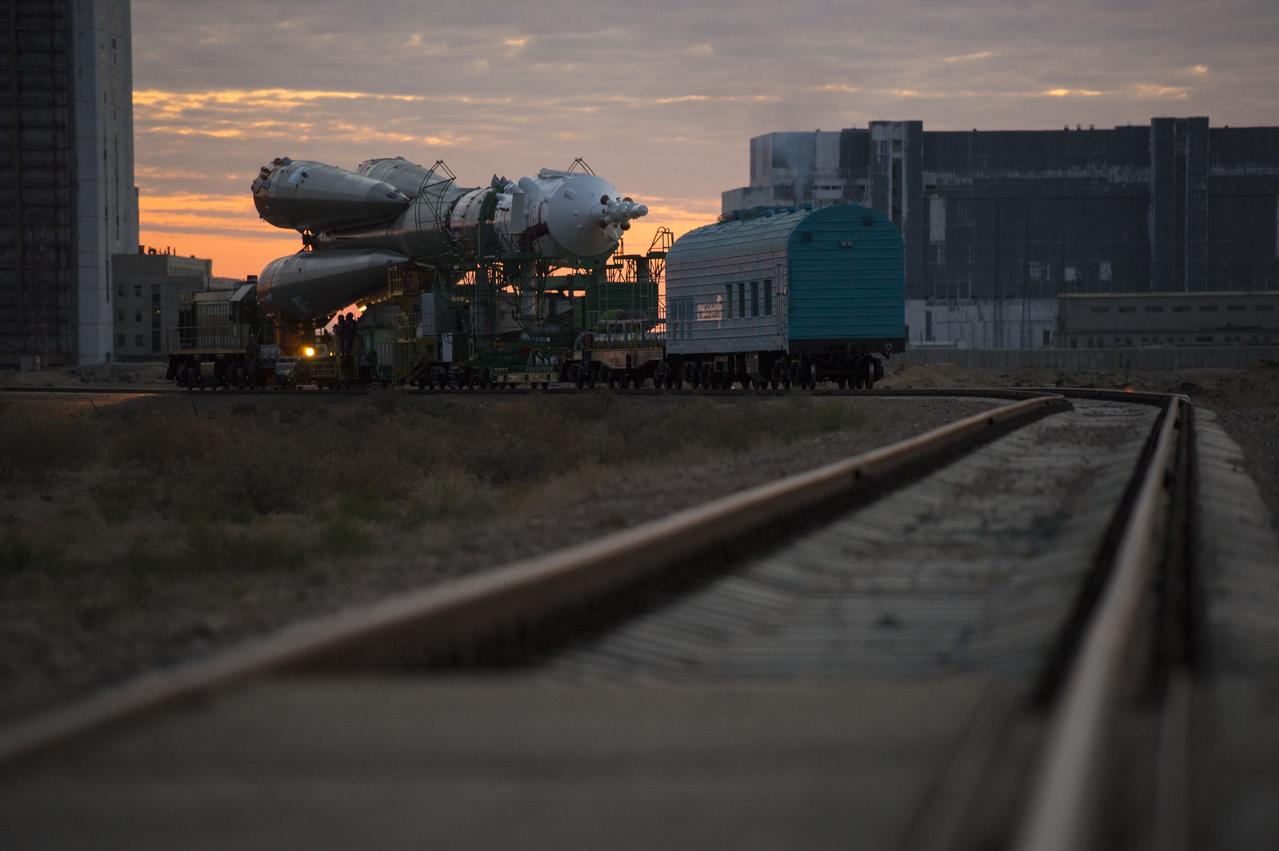 The Soyuz TMA-14M spacecraft is rolled out to the launch pad by train on Tuesday, Sept. 23, 2014 at the Baikonur Cosmodrome in Kazakhstan.  Launch of the Soyuz rocket is scheduled for Sept. 26 and will carry Expedition 41 Soyuz Commander Alexander Samokutyaev of the Russian Federal Space Agency (Roscosmos), Flight Engineer Barry Wilmore of NASA, and Flight Engineer Elena Serova of Roscosmos into orbit to begin their five and a half month mission on the International Space Station. Photo Credit: (NASA/Aubrey Gemignani)