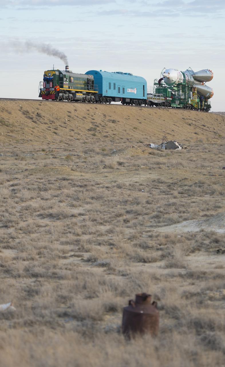The Soyuz TMA-14M spacecraft is rolled out to the launch pad by train on Tuesday, Sept. 23, 2014 at the Baikonur Cosmodrome in Kazakhstan.  Launch of the Soyuz rocket is scheduled for Sept. 26 and will carry Expedition 41 Soyuz Commander Alexander Samokutyaev of the Russian Federal Space Agency (Roscosmos), Flight Engineer Barry Wilmore of NASA, and Flight Engineer Elena Serova of Roscosmos into orbit to begin their five and a half month mission on the International Space Station. Photo Credit: (NASA/Aubrey Gemignani)