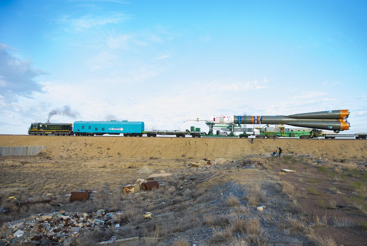 The Soyuz TMA-14M spacecraft is rolled out to the launch pad by train on Tuesday, Sept. 23, 2014 at the Baikonur Cosmodrome in Kazakhstan.  Launch of the Soyuz rocket is scheduled for Sept. 26 and will carry Expedition 41 Soyuz Commander Alexander Samokutyaev of the Russian Federal Space Agency (Roscosmos), Flight Engineer Barry Wilmore of NASA, and Flight Engineer Elena Serova of Roscosmos into orbit to begin their five and a half month mission on the International Space Station. Photo Credit: (NASA/Aubrey Gemignani)