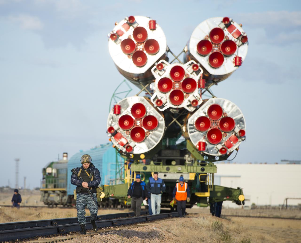 The Soyuz TMA-14M spacecraft is rolled out to the launch pad by train on Tuesday, Sept. 23, 2014 at the Baikonur Cosmodrome in Kazakhstan.  Launch of the Soyuz rocket is scheduled for Sept. 26 and will carry Expedition 41 Soyuz Commander Alexander Samokutyaev of the Russian Federal Space Agency (Roscosmos), Flight Engineer Barry Wilmore of NASA, and Flight Engineer Elena Serova of Roscosmos into orbit to begin their five and a half month mission on the International Space Station. Photo Credit: (NASA/Aubrey Gemignani)
