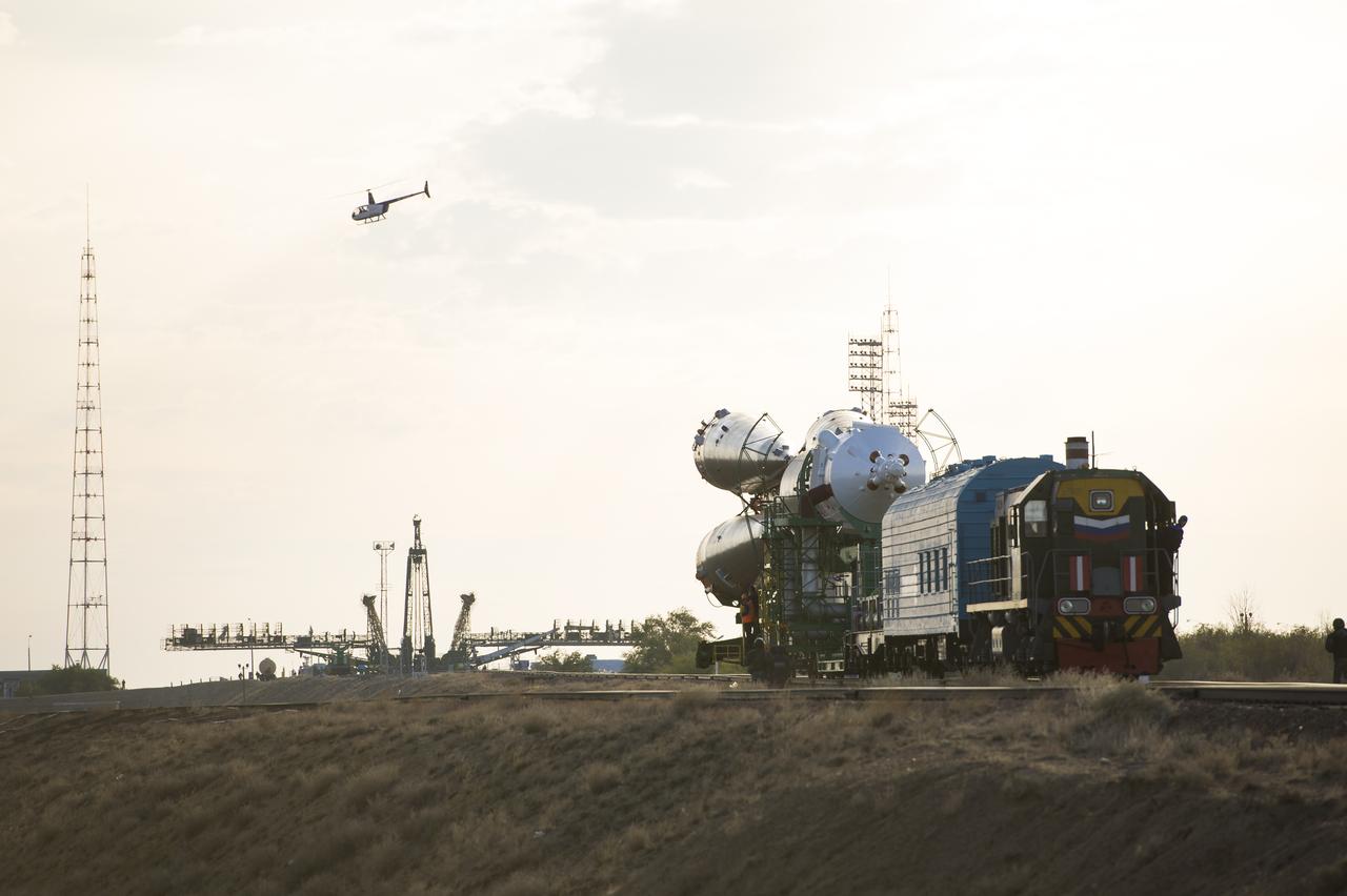 The Soyuz TMA-14M spacecraft is rolled out to the launch pad by train on Tuesday, Sept. 23, 2014 at the Baikonur Cosmodrome in Kazakhstan.  Launch of the Soyuz rocket is scheduled for Sept. 26 and will carry Expedition 41 Soyuz Commander Alexander Samokutyaev of the Russian Federal Space Agency (Roscosmos), Flight Engineer Barry Wilmore of NASA, and Flight Engineer Elena Serova of Roscosmos into orbit to begin their five and a half month mission on the International Space Station. Photo Credit: (NASA/Aubrey Gemignani)