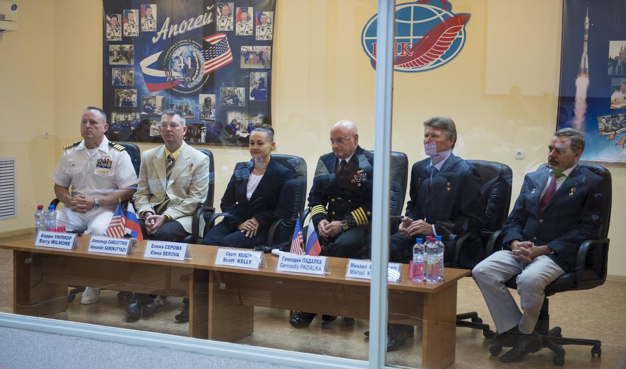 Expedition 41 prime crew members, from left to right, Flight Engineer Barry Wilmore of NASA, Soyuz Commander Alexander Samokutyaev of the Russian Federal Space Agency (Roscosmos), and Flight Engineer Elena Serova of Roscosmos are seen here with the backup crew members, Flight Engineer Scott Kelly of NASA, Soyuz Commander Gennadi Padalka of Roscosmos, and Flight Engineer Mikhail Kornienko of Roscosmos at the State Commission meeting to approve the Soyuz launch of Expedition 41 to the International Space Station in Baikonur, Kazakhstan on Wedneday, Sept. 24, 2014. The mission to the is set to launch Sept. 26 from the Baikonur Cosmodrome. Photo Credit: (NASA/Aubrey Gemignani)