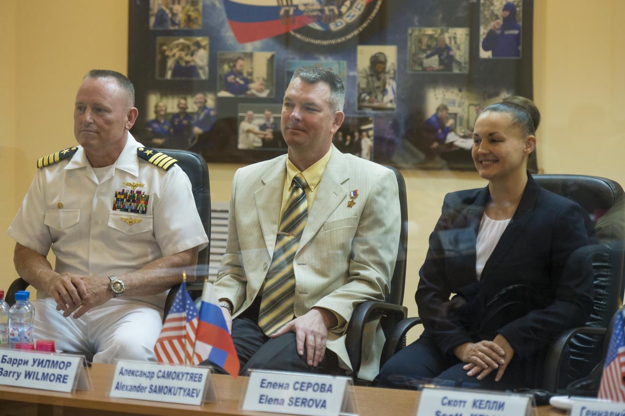 Expedition 41 prime crew members, Flight Engineer Barry Wilmore of NASA, Soyuz Commander Alexander Samokutyaev of the Russian Federal Space Agency (Roscosmos), and Flight Engineer Elena Serova of Roscosmos, are seen at the State Commission meeting to approve the Soyuz launch of Expedition 41 to the International Space Station in Baikonur, Kazakhstan on Wedneday, Sept. 24, 2014. The mission is set to launch Sept. 26 from the Baikonur Cosmodrome. Photo Credit: (NASA/Aubrey Gemignani)