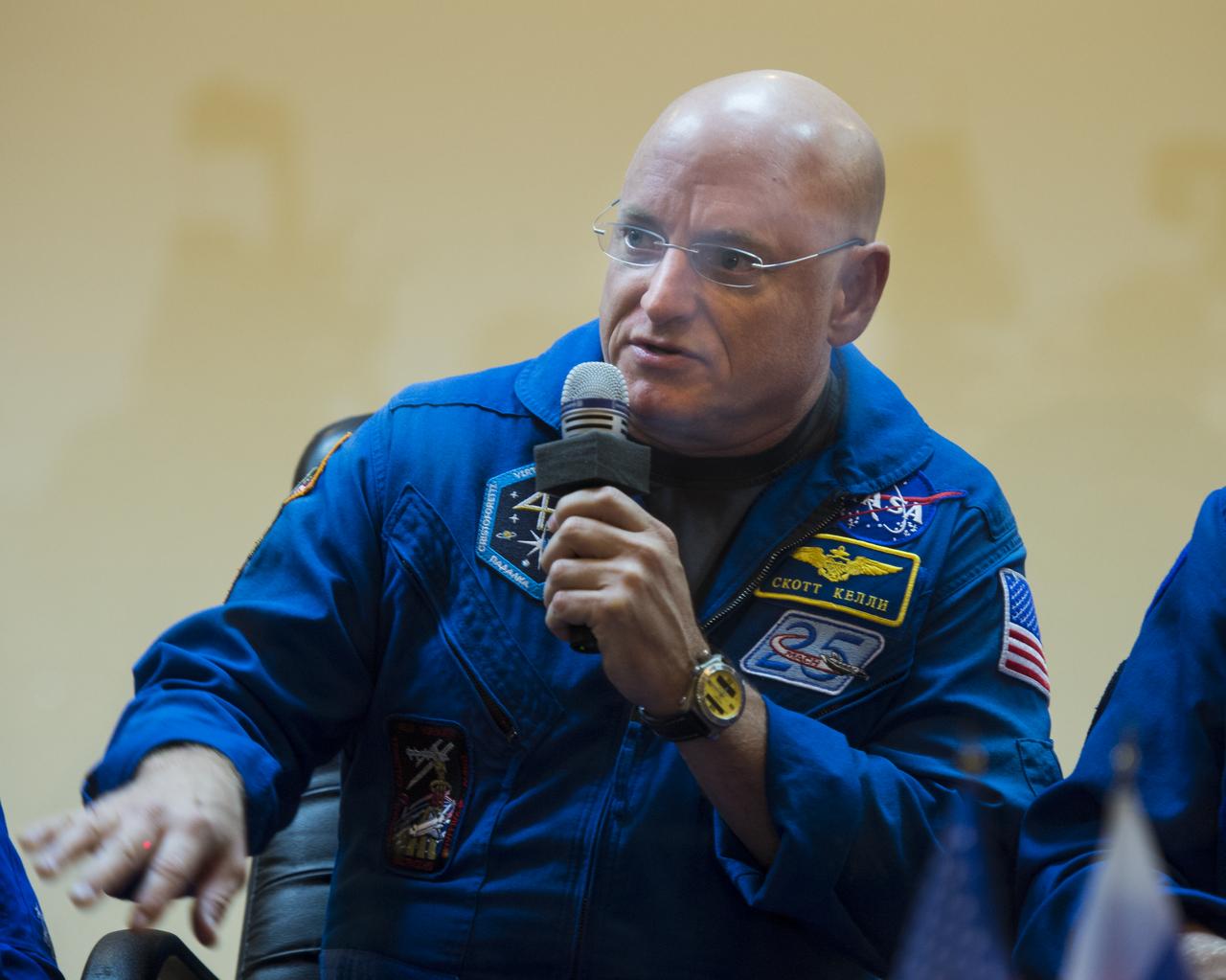 NASA Expedition 41 backup crew member Flight Engineer Scott Kelly of NASA answers a question during a press conference Wednesday, Sept. 24, 2014 at the Cosmonaut Hotel in Baikonur, Kazakhstan.  Expedition 41 Flight Engineer Barry Wilmore of NASA, Soyuz Commander Alexander Samokutyaev of the Russian Federal Space Agency (Roscosmos), and Flight Engineer Elena Serova of Roscosmos are set to launch Sept. 26 from the Baikonur Cosmodrome.  Photo Credit: (NASA/Aubrey Gemignani)