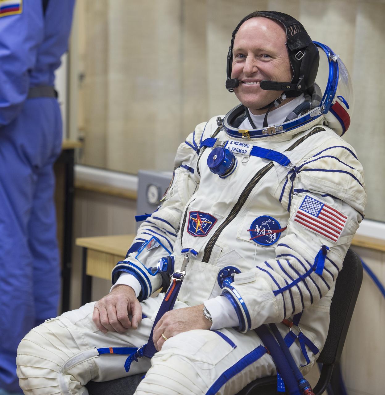 Expedition 41 Flight Engineer Barry Wilmore of NASA waits to have his Russian Sokol suit pressure checked in preparation for his launch aboard the Soyuz TMA-14M spacecraft on Thursday, Sept. 25, 2014, at the Baikonur Cosmodrome in Baikonur, Kazakhstan. Launch of the Soyuz rocket is scheduled for the early hours of Sept. 26 (Kazakhstan time) and will carry Wilmore and fellow crewmates, Flight Engineer Elena Serova and Soyuz Commander Alexander Samokutyaev of the Russian Federal Space Agency (Roscosmos), into orbit to begin their five and a half month mission on the International Space Station. Photo Credit: (NASA/Aubrey Gemignani)