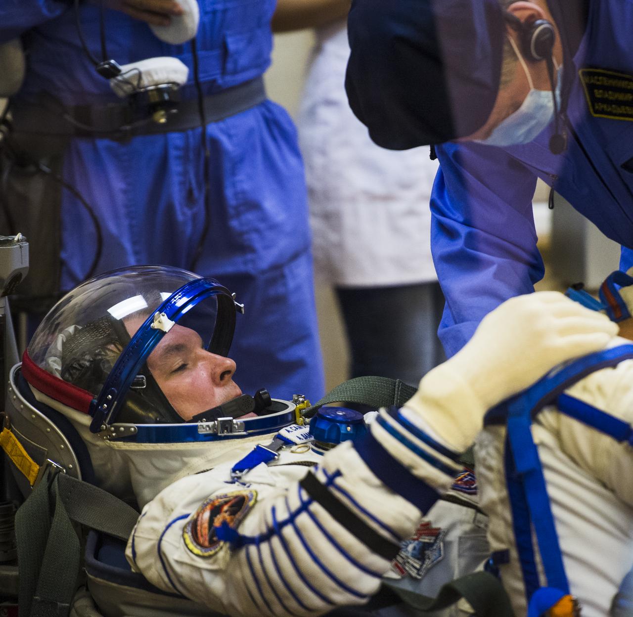 Expedition 41 Soyuz Commander Alexander Samokutyaev of the Russian Federal Space Agency (Roscosmos) has his Russian Sokol suit pressure checked in preparation for his launch onboard the Soyuz TMA-14M spacecraft on Thursday, September 25, 2014 at the Baikonur Cosmodrome in Kazakhstan.  The Soyuz spacecraft with Samokutyaev, Expedition 41 Flight Engineer Elena Serova of Roscosmos and Flight Engineer Barry Wilmore of NASA is scheduled to launch at 2:25 a.m. Kazakhstan Time on Friday, September 26. Photo Credit: (NASA/Joel Kowsky)