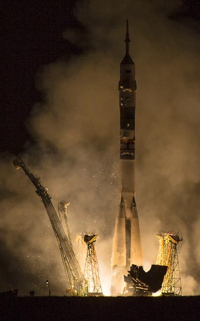 The Soyuz TMA-14M rocket is launched with Expedition 41 Soyuz Commander Alexander Samokutyaev of the Russian Federal Space Agency (Roscosmos) Flight Engineer Elena Serova of Roscosmos, and Flight Engineer Barry Wilmore of NASA, Friday, September 26, 2014 at the Baikonur Cosmodrome in Kazakhstan. Samokutyaev, Serova, and Wilmore will spend the next five and a half months aboard the International Space Station.  Serova will become the fourth Russian woman to fly in space and the first Russian woman to live and work on the station. Photo Credit: (NASA/Joel Kowsky)