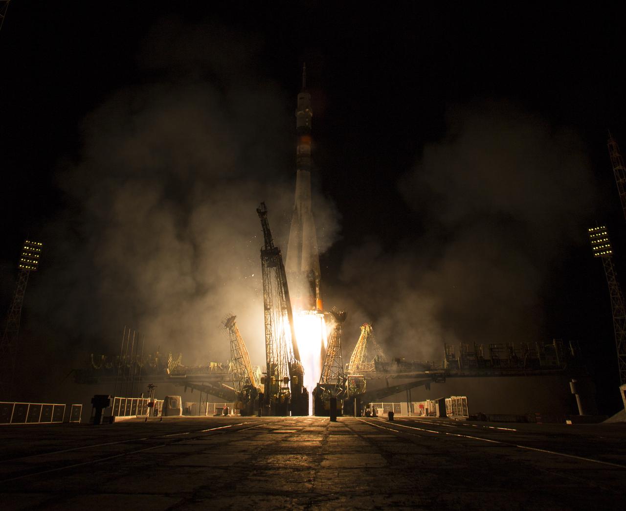 The Soyuz TMA-14M rocket launches from the Baikonur Cosmodrome in Kazakhstan on Friday, Sept. 26, 2014 carrying Expedition 41 Soyuz Commander Alexander Samokutyaev of the Russian Federal Space Agency (Roscosmos), Flight Engineer Barry Wilmore of NASA, and Flight Engineer Elena Serova of Roscosmos into orbit to begin their five and a half month mission on the International Space Station.  (Photo Credit: NASA/Aubrey Gemignani)