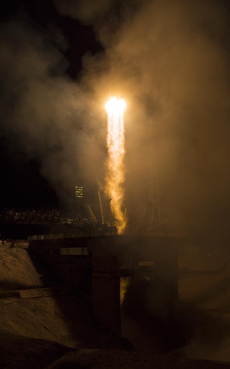 The Soyuz TMA-14M rocket launches from the Baikonur Cosmodrome in Kazakhstan on Friday, Sept. 26, 2014 carrying Expedition 41 Soyuz Commander Alexander Samokutyaev of the Russian Federal Space Agency (Roscosmos), Flight Engineer Barry Wilmore of NASA, and Flight Engineer Elena Serova of Roscosmos into orbit to begin their five and a half month mission on the International Space Station.  (Photo Credit: NASA/Aubrey Gemignani)