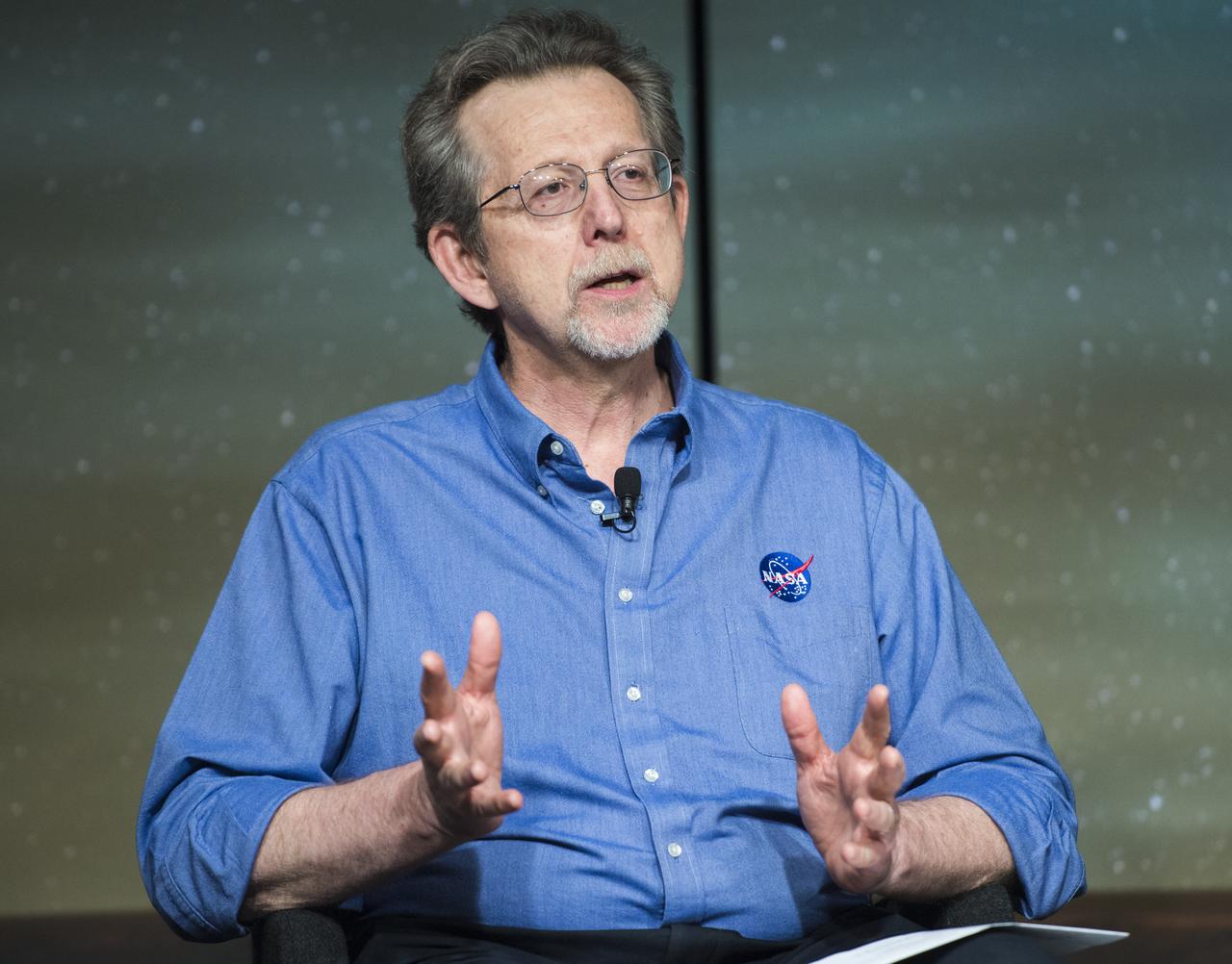 Jim Green, director, Planetary Science Division, NASA Headquarters, Washington gives remarks during a media briefing where he and other panelists outlined how space and Earth-based assets will be used to image and study comet Siding Spring during its Sunday, Oct. 19 flyby of Mars, Thursday, Oct. 9, 2014 at NASA Headquarters in Washington.  Photo Credit: (NASA/Joel Kowsky)