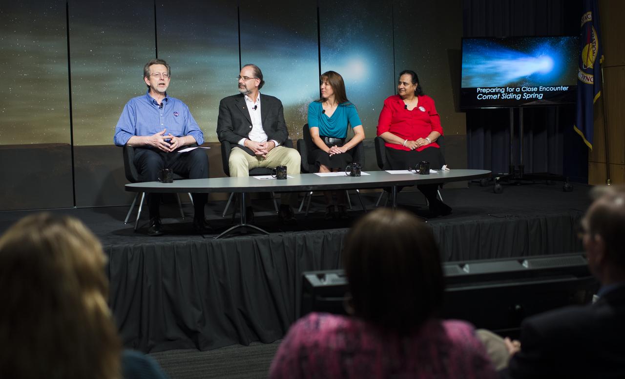 Panelists, from left, Jim Green, director, Planetary Science Division, NASA Headquarters, Washington, Carey Lisse, senior astrophysicist, Johns Hopkins University Applied Physics Laboratory, Laurel, Maryland, Kelly Fast, program scientist, Planetary Science Division, NASA Headquarters, Washington, and Padma Yanamandra-Fisher, senior research scientist, Space Science Institute, Rancho Cucamonga Branch, California, are seen during a media briefing where they outlined how space and Earth-based assets will be used to image and study comet Siding Spring during its Sunday, Oct. 19 flyby of Mars, Thursday, Oct. 9, 2014 at NASA Headquarters in Washington. (Photo credit: NASA/Joel Kowsky)