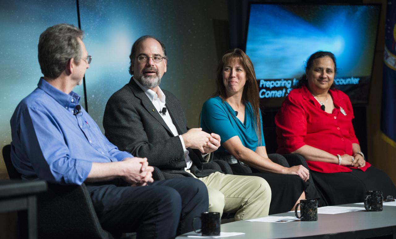 Panelists, from left, Jim Green, director, Planetary Science Division, NASA Headquarters, Washington, Carey Lisse, senior astrophysicist, Johns Hopkins University Applied Physics Laboratory, Laurel, Maryland, Kelly Fast, program scientist, Planetary Science Division, NASA Headquarters, Washington, and Padma Yanamandra-Fisher, senior research scientist, Space Science Institute, Rancho Cucamonga Branch, California, are seen during a media briefing where they outlined how space and Earth-based assets will be used to image and study comet Siding Spring during its Sunday, Oct. 19 flyby of Mars, Thursday, Oct. 9, 2014 at NASA Headquarters in Washington. (Photo credit: NASA/Joel Kowsky)