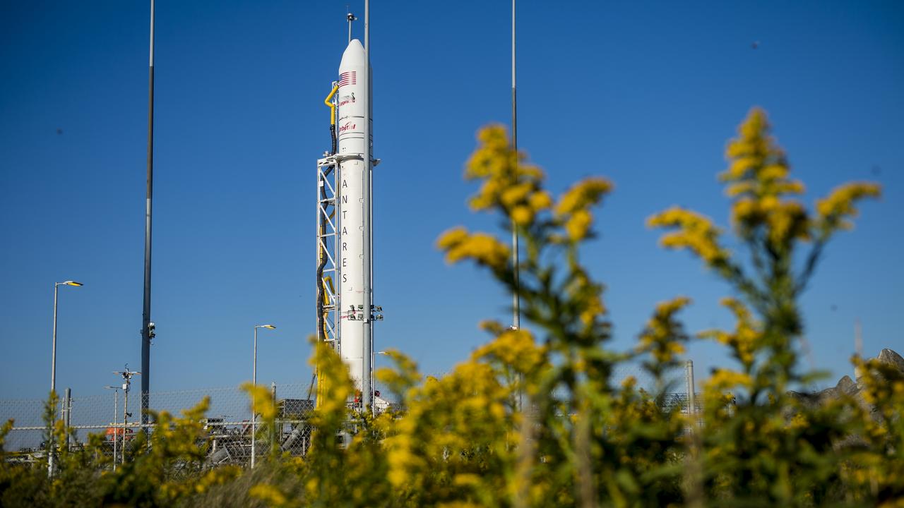 The Orbital Sciences Corporation Antares rocket, with the Cygnus spacecraft onboard, is seen on launch Pad-0A, Saturday, Oct. 25, 2014, at NASA's Wallops Flight Facility in Virginia. The Antares will launch with the Cygnus spacecraft filled with over 5,000 pounds of supplies for the International Space Station, including science experiments, experiment hardware, spare parts, and crew provisions. The Orbital-3 mission is Orbital Sciences' third contracted cargo delivery flight to the space station for NASA.  Launch is scheduled for Monday, Oct. 27 at 6:45 p.m. EDT.  Photo Credit: (NASA/Joel Kowsky)