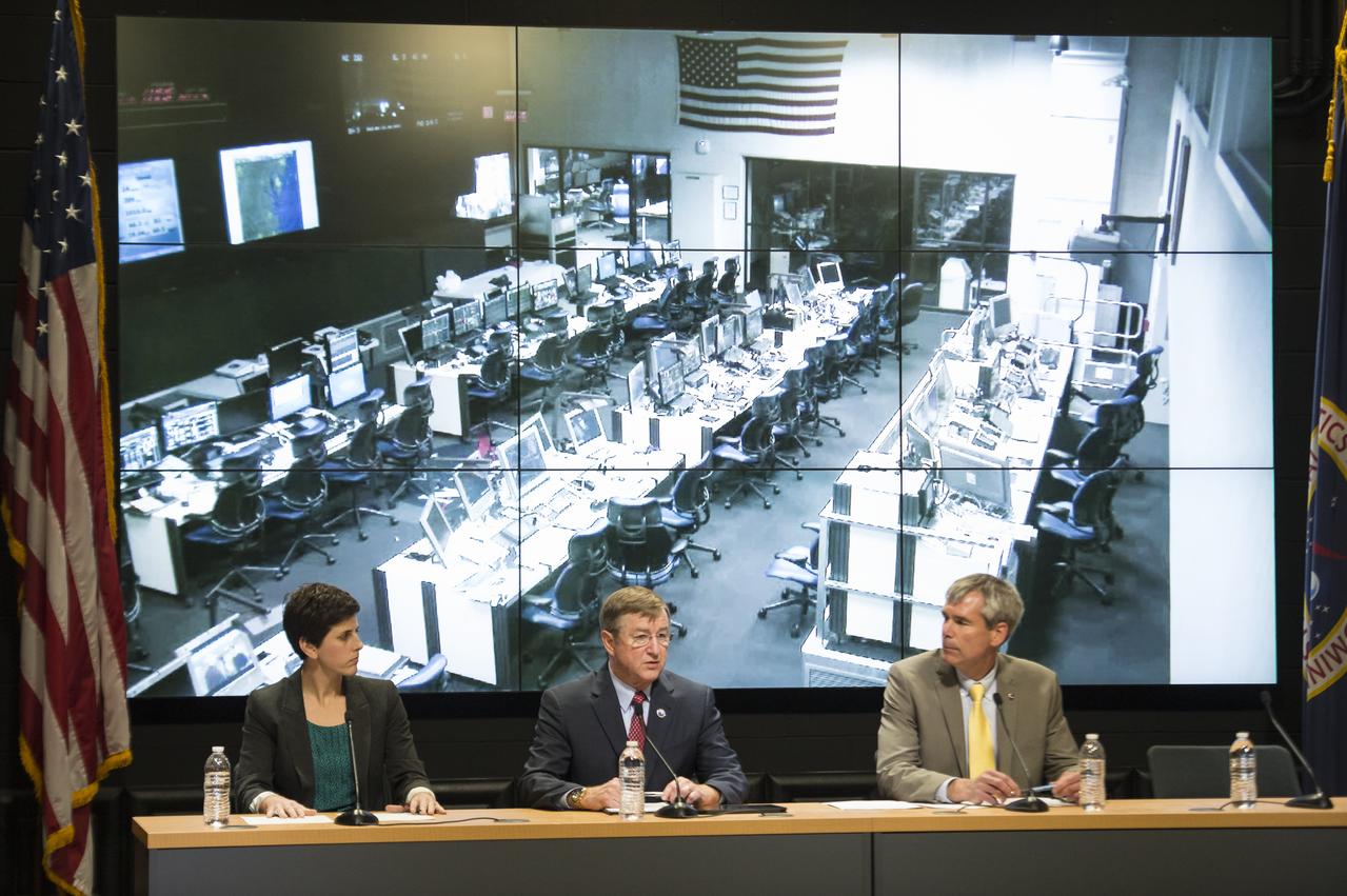 Rachel Kraft, NASA public affairs officer, left, Frank Culbertson, Executive Vice President and General Manager of Advanced Program Group at Orbital Sciences Corp., center, Bill Wrobel, director of NASA's Wallops Flight Facility, right, are seen during a press conference held after a mishap occurred during the launch of the Antares rocket, with the Cygnus cargo spacecraft aboard, Tuesday, Oct. 28, 2014, NASA Wallops Flight Facility, Virginia. William Gerstenmaier, associate administrator of NASA's Human Exploration and Operations Mission Directorate and Michael Suffredini, NASA's International Space Station Program Manager also participated in the press conference via phone. Cygnus was on its way to rendezvous with the space station. The Antares rocket lifted off to start its third resupply mission to the International Space Station, but suffered a catastrophic anomaly shortly after liftoff at 6:22 p.m. EDT. Photo Credit: (NASA/Joel Kowsky)