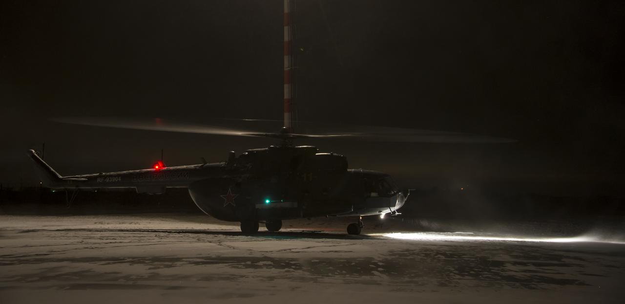 A Russian Search and Rescue helicopter prepares to take off from Kustanay, Kazakhstan to support the Soyuz TMA-13M spacecraft landing with Expedition 41 Commander Max Suraev of the Russian Federal Space Agency (Roscosmos), NASA Flight Engineer Reid Wiseman and Flight Engineer Alexander Gerst of the European Space Agency (ESA) on Monday, Nov. 10, 2014. Suraev, Wiseman and Gerst returned to Earth after more than five months onboard the International Space Station where they served as members of the Expedition 40 and 41 crews. Photo Credit: (NASA/Bill Ingalls)
