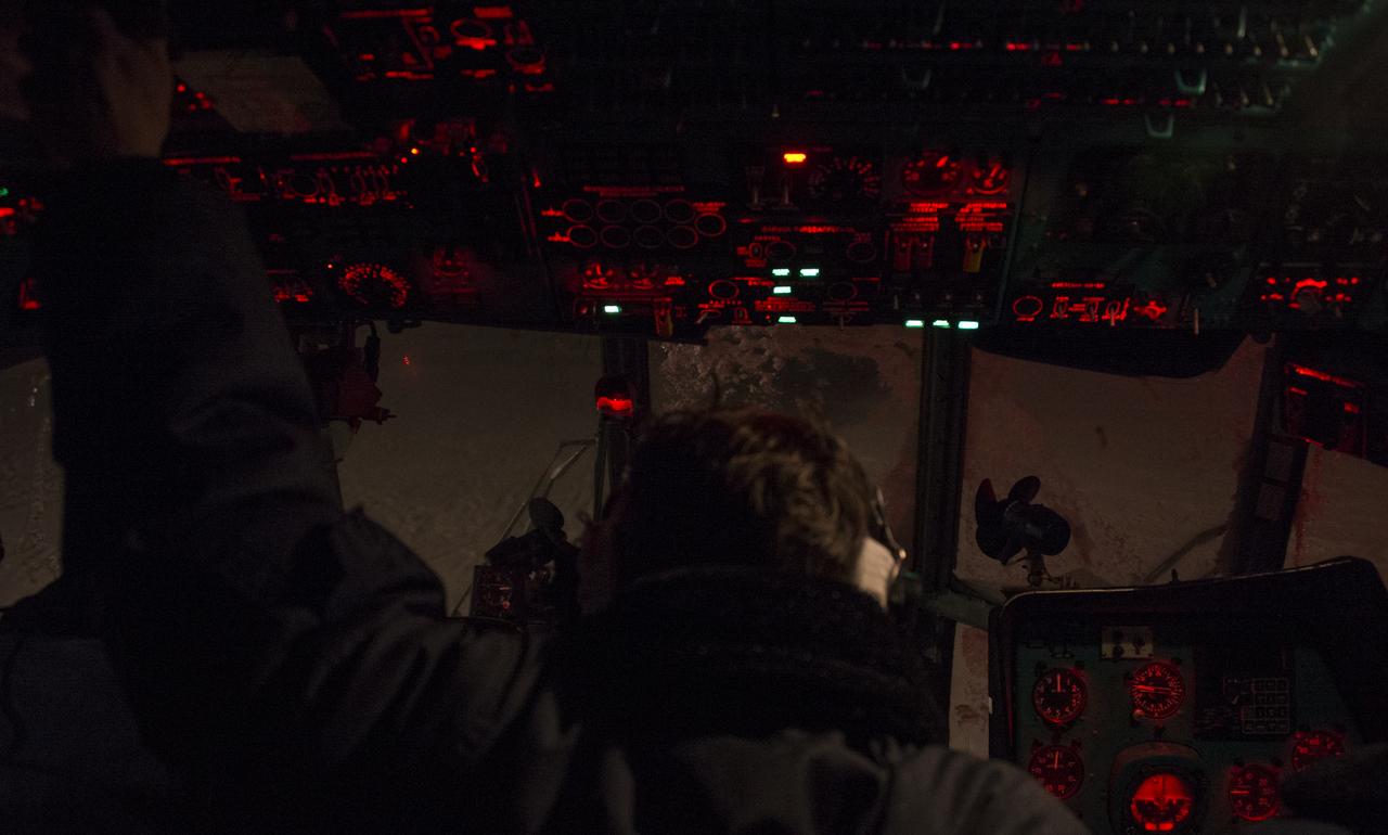 A Russian search and rescue helicopter crew waits for the weather to clear before taking off from Kustanay, Kazakhstan to support the Soyuz TMA-13M spacecraft landing with Expedition 41 Commander Max Suraev of the Russian Federal Space Agency (Roscosmos), NASA Flight Engineer Reid Wiseman and Flight Engineer Alexander Gerst of the European Space Agency (ESA) on Monday, Nov. 10, 2014. Suraev, Wiseman and Gerst returned to Earth after more than five months onboard the International Space Station where they served as members of the Expedition 40 and 41 crews. Photo Credit: (NASA/Bill Ingalls)