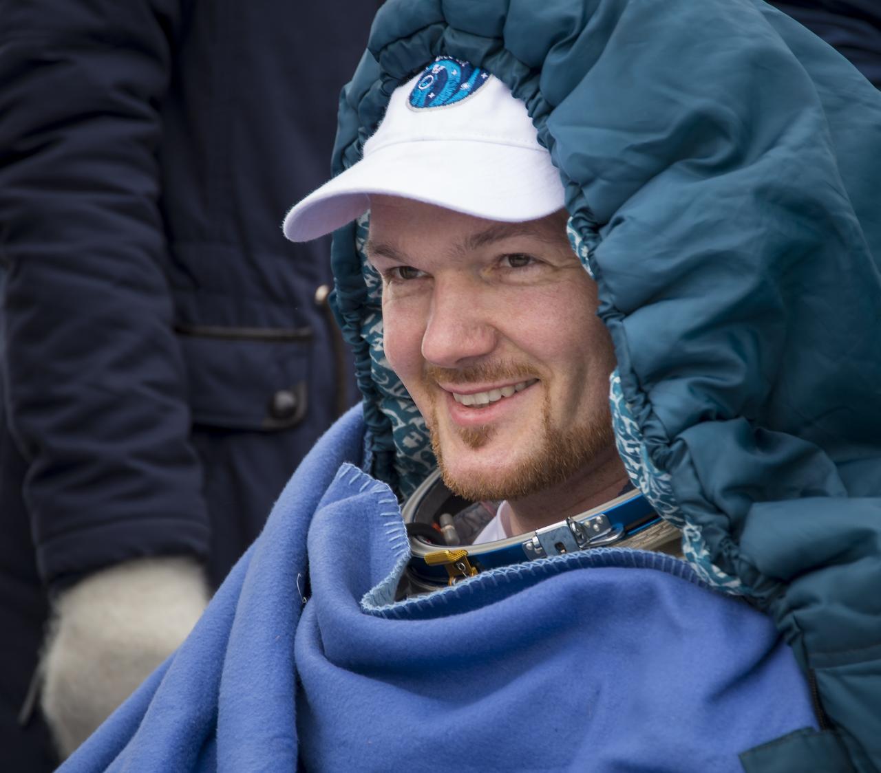 Expedition 41 Flight Engineer Alexander Gerst of the European Space Agency (ESA) rests in a chair outside the Soyuz Capsule just minutes after he and Expedition 41 Commander Max Suraev of the Russian Federal Space Agency (Roscosmos), and NASA Flight Engineer Reid Wiseman landed in their Soyuz TMA-13M capsule in a remote area near the town of Arkalyk, Kazakhstan on Monday, Nov. 10, 2014. Suraev, Wiseman and Gerst returned to Earth after more than five months onboard the International Space Station where they served as members of the Expedition 40 and 41 crews. Photo Credit: (NASA/Bill Ingalls)