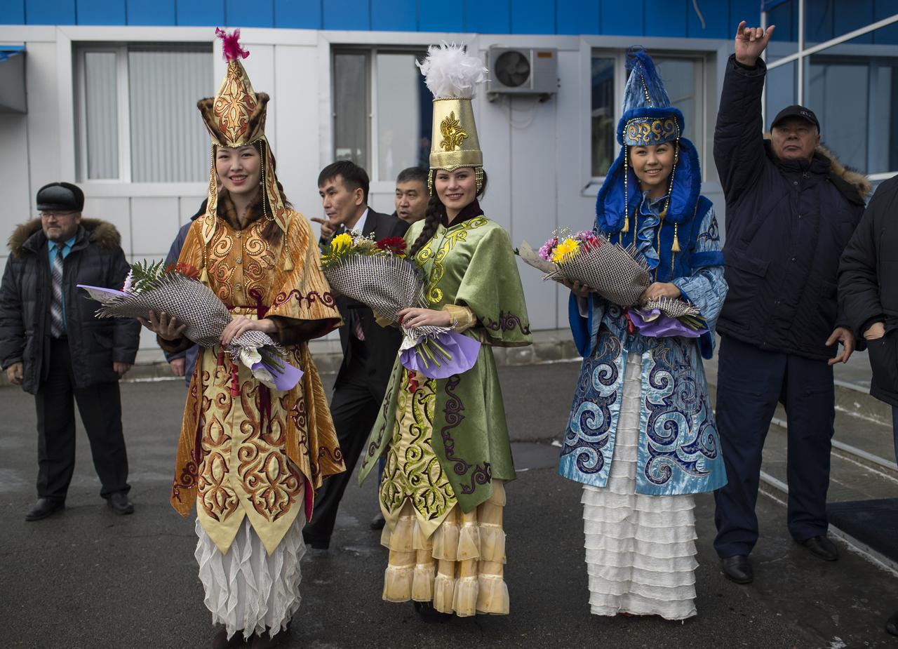 Women in ceremonial Kazakh dress prepare to welcome home Expedition 41 Commander Max Suraev of the Russian Federal Space Agency (Roscosmos), NASA Flight Engineer Reid Wiseman and Flight Engineer Alexander Gerst of the European Space Agency (ESA) at the Kustanay Airport a few hours after they landed near the town of Arkalyk, Kazakhstan on on Monday, Nov. 10, 2014. Suraev, Wiseman and Gerst returned to Earth after more than five months onboard the International Space Station where they served as members of the Expedition 40 and 41 crews. Photo Credit: (NASA/Bill Ingalls)