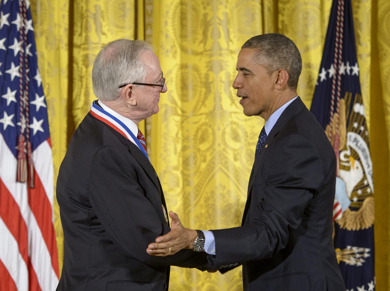 President Barack Obama congratulates MESSENGER Principal Investigator, director of Columbia University's Lamont-Doherty Earth Observatory, Sean Solomon,  after awarding him the National Medal of Science, the nation's top scientific honor,Thursday, Nov. 20, 2014 during a ceremony in the East Room of the White House in Washington. MESSENGER (MErcury Surface, Space ENvironment, GEochemistry, and Ranging) is a NASA-sponsored scientific investigation of the planet Mercury and the first space mission designed to orbit the planet closest to the Sun. Photo Credit: (NASA/Bill Ingalls)