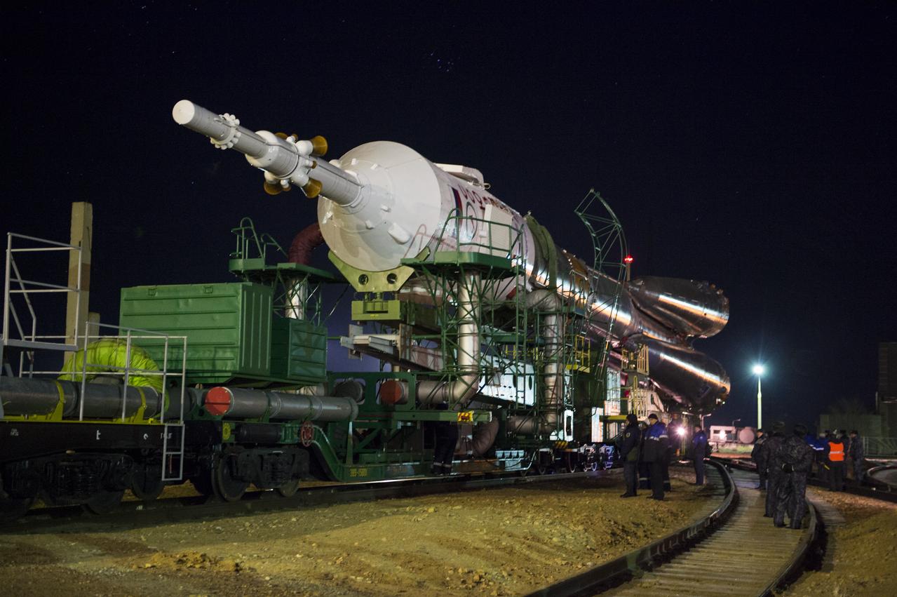 The Soyuz TMA-15M spacecraft is rolled out to the launch pad by train on Friday, Nov. 21, 2014 at the Baikonur Cosmodrome in Kazakhstan.  Launch of the Soyuz rocket is scheduled for Nov. 24 and will carry Expedition 42 Soyuz Commander Anton Shkaplerov of the Russian Federal Space Agency (Roscosmos), Flight Engineer Terry Virts of NASA , and Flight Engineer Samantha Cristoforetti of the European Space Agency into orbit to begin their five and a half month mission on the International Space Station. Photo Credit: (NASA/Aubrey Gemignani)