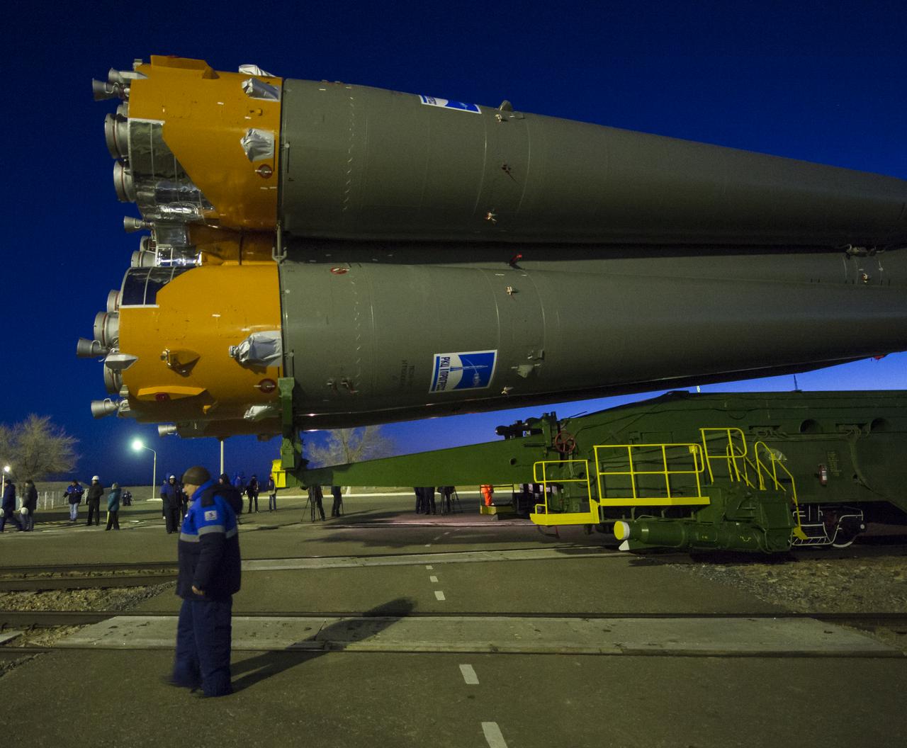 The Soyuz TMA-15M spacecraft is rolled out to the launch pad by train on Friday, Nov. 21, 2014 at the Baikonur Cosmodrome in Kazakhstan.  Launch of the Soyuz rocket is scheduled for Nov. 24 and will carry Expedition 42 Soyuz Commander Anton Shkaplerov of the Russian Federal Space Agency (Roscosmos), Flight Engineer Terry Virts of NASA , and Flight Engineer Samantha Cristoforetti of the European Space Agency into orbit to begin their five and a half month mission on the International Space Station. Photo Credit: (NASA/Aubrey Gemignani)