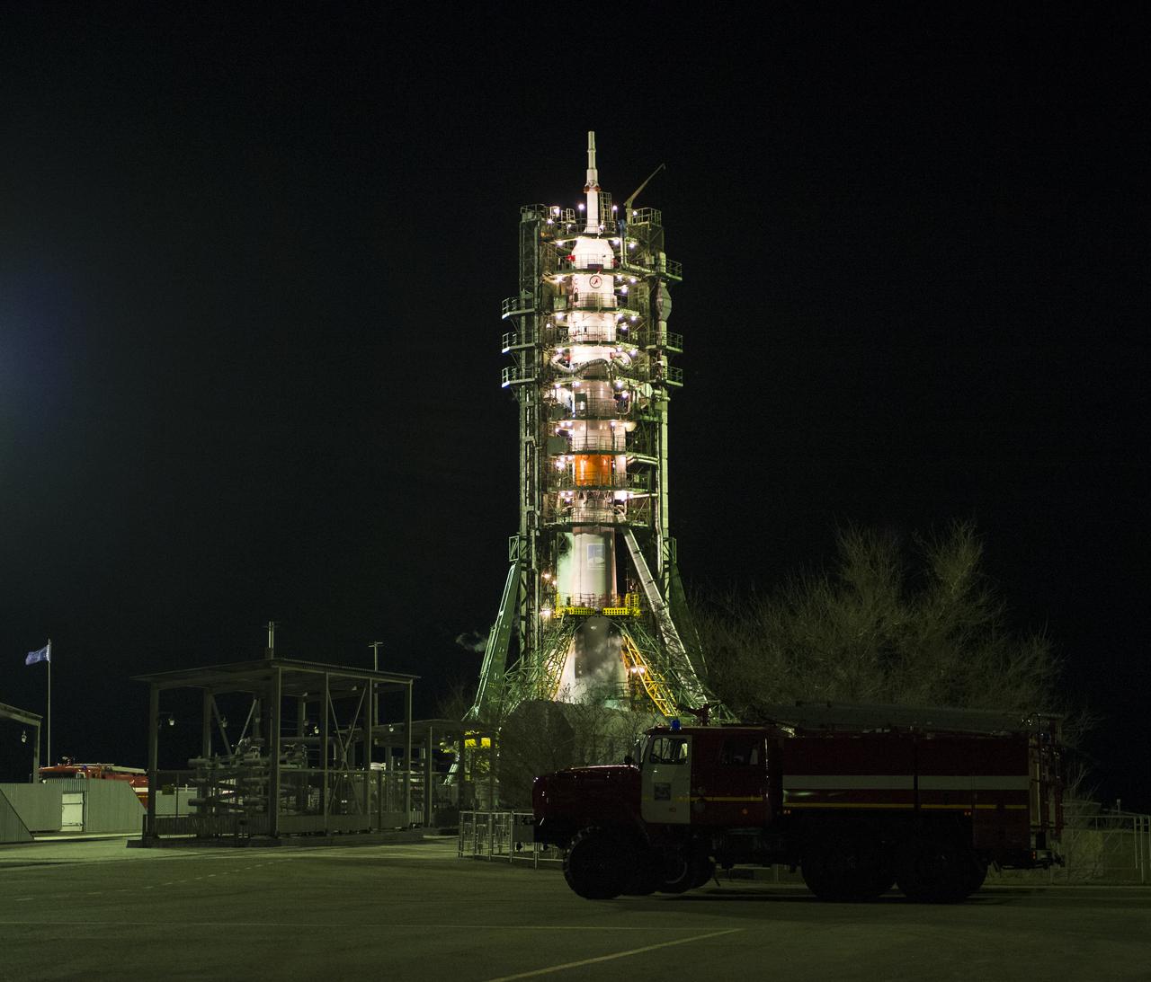 The Soyuz TMA-15M spacecraft is seen on the launch pad just prior to launch on Monday, Nov. 24, 2014 at the Baikonur Cosmodrome in Kazakhstan. Launch of the Soyuz rocket is scheduled for the early hours of Nov. 24 and will carry Expedition 42 Soyuz Commander Anton Shkaplerov of the Russian Federal Space Agency (Roscosmos), Flight Engineer Terry Virts of NASA , and Flight Engineer Samantha Cristoforetti of the European Space Agency into orbit to begin their five and a half month mission on the International Space Station. Photo Credit: (NASA/Aubrey Gemignani)