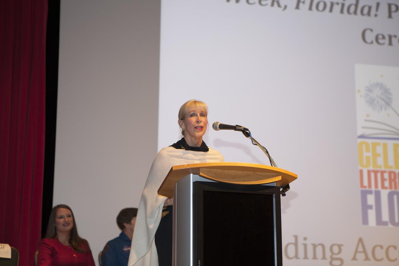 CAPE CANAVERAL, Fla. – First Lady of the State of Florida Ann Scott speaks to students, parents and guests inside the Astronaut Encounter Theater at NASA’s Kennedy Space Center in Florida during the 2015 Celebrate Literacy Week Florida PSA Awards program. The event, hosted by the Florida Department of Education, announced the winning entries from elementary, middle and high school students that best encouraged literacy and its connection to space careers. Photo credit: NASA/Ben Smegelsky