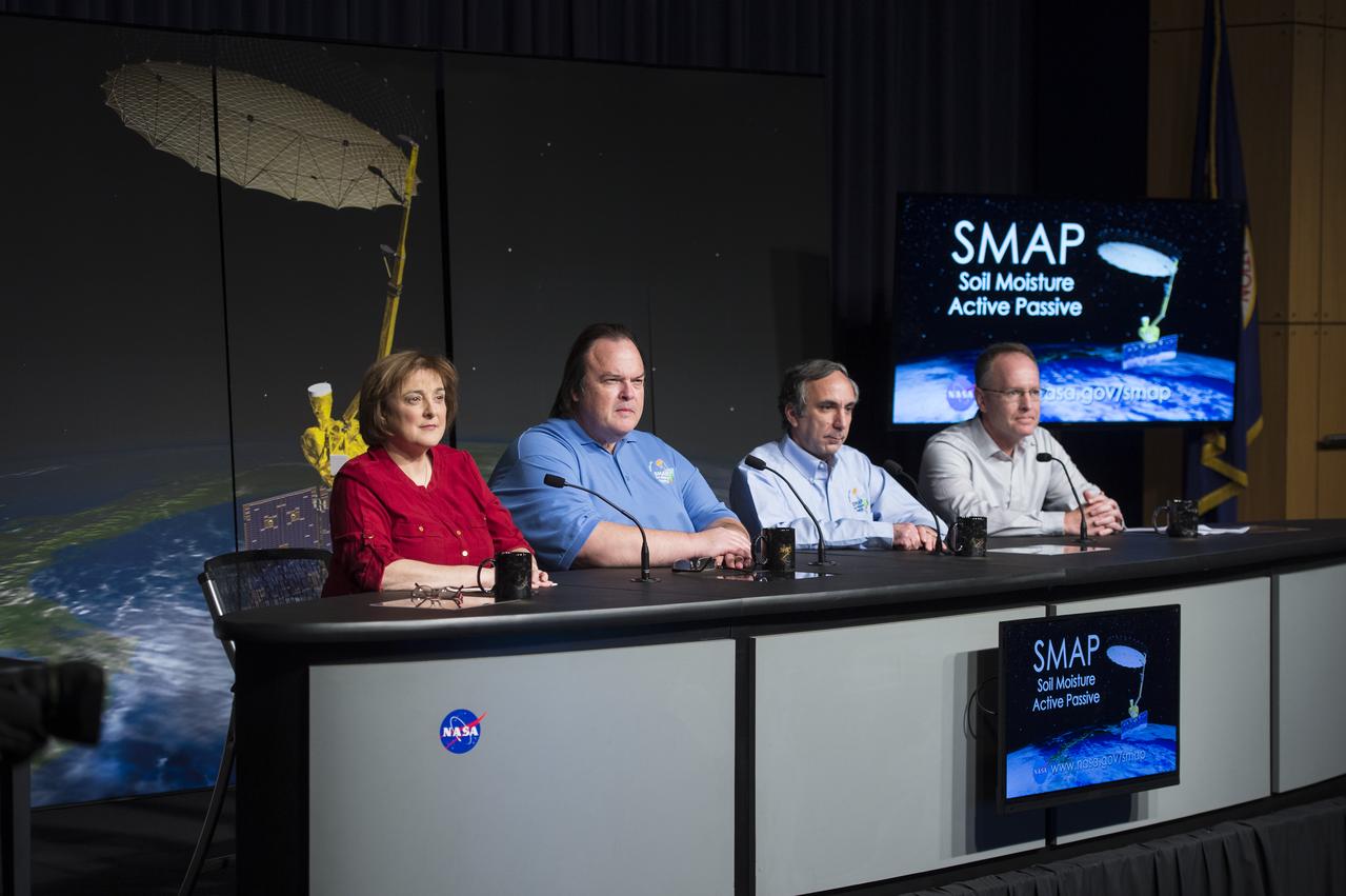 Christine Bonniksen, SMAP program executive with the Science Mission Directorate’s Earth Science Division, NASA Headquarters, left, Kent Kellogg, SMAP project manager, NASA Jet Propulsion Laboratory (JPL), second from left, Dara Entekhabi, SMAP science team lead, Massachusetts Institute of Technology, second from right, and Brad Doorn, SMAP applications lead, Science Mission Directorate’s Applied Sciences Program, NASA Headquarters, right, are seen during a briefing about the upcoming launch of the Soil Moisture Active Passive (SMAP) mission, Thursday, Jan. 08, 2015, at NASA Headquarters in Washington DC. The mission is scheduled for a Jan. 29 launch from Vandenberg Air Force Base in California, and will provide the most accurate, highest-resolution global measurements of soil moisture ever obtained from space. The data will be used to enhance scientists' understanding of the processes that link Earth's water, energy and carbon cycles. Photo Credit: (NASA/Aubrey Gemignani)