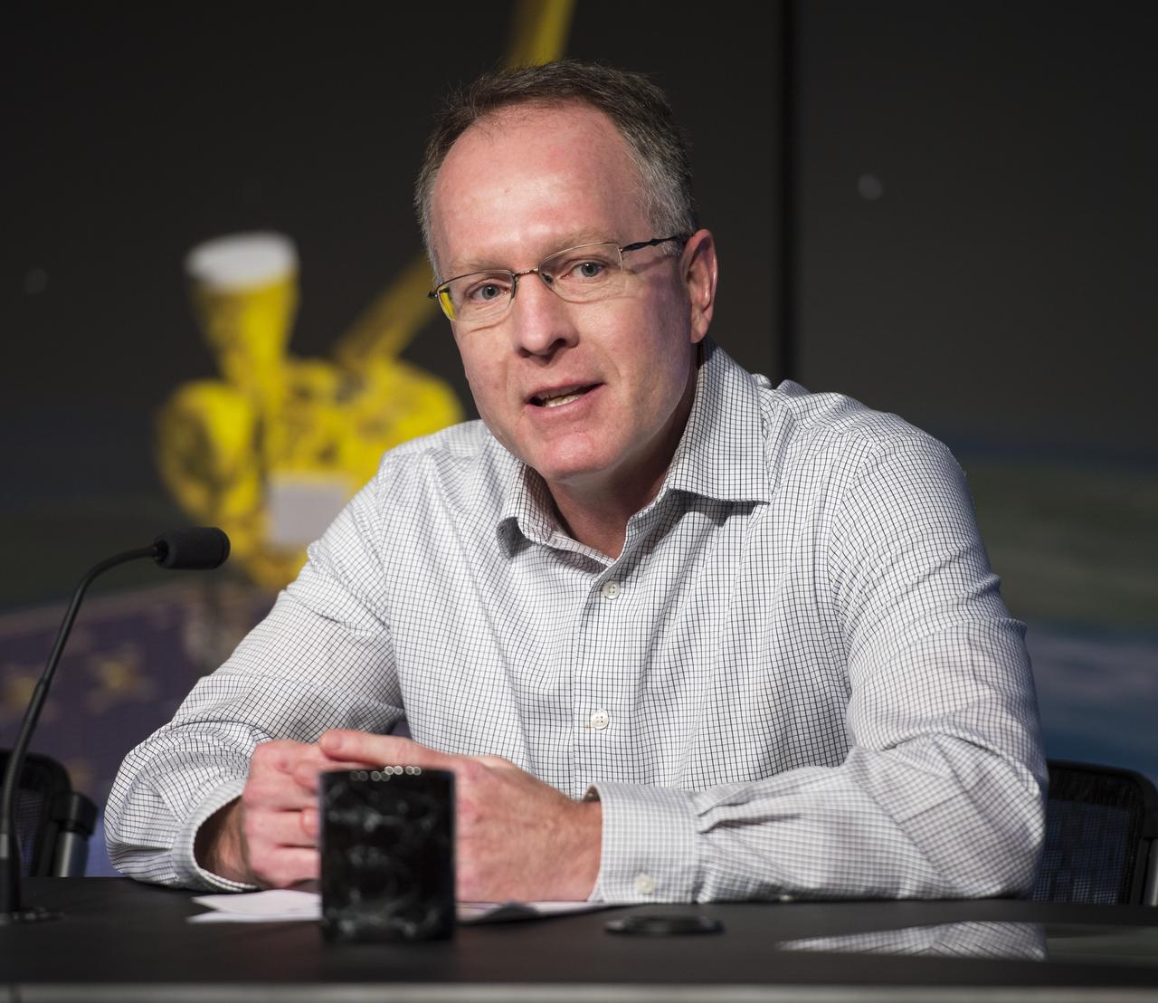 Brad Doorn, SMAP applications lead, Science Mission Directorate’s Applied Sciences Program at NASA Headquarters speaks during a briefing about the upcoming launch of the Soil Moisture Active Passive (SMAP) mission, Thursday, Jan. 08, 2015, at NASA Headquarters in Washington DC. The mission is scheduled for a Jan. 29 launch from Vandenberg Air Force Base in California, and will provide the most accurate, highest-resolution global measurements of soil moisture ever obtained from space. The data will be used to enhance scientists' understanding of the processes that link Earth's water, energy and carbon cycles. Photo Credit: (NASA/Aubrey Gemignani)