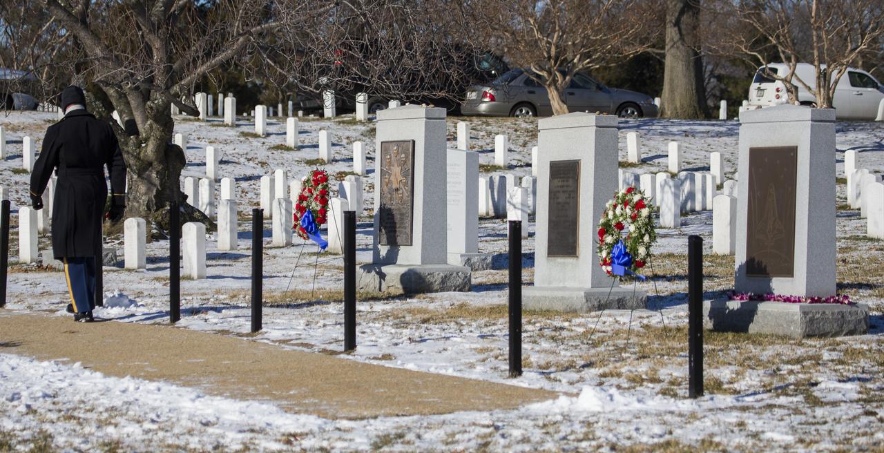 The Space Shuttle Columbia and Space Shuttle Challenger memorials are seen after a wreath laying ceremony that was part of NASA's Day of Remembrance, Wednesday, Jan. 28, 2015, at Arlington National Cemetery in Arlington, Va.  The wreaths were laid in memory of those men and women who lost their lives in the quest for space exploration.  Photo Credit: (NASA/Joel Kowsky)