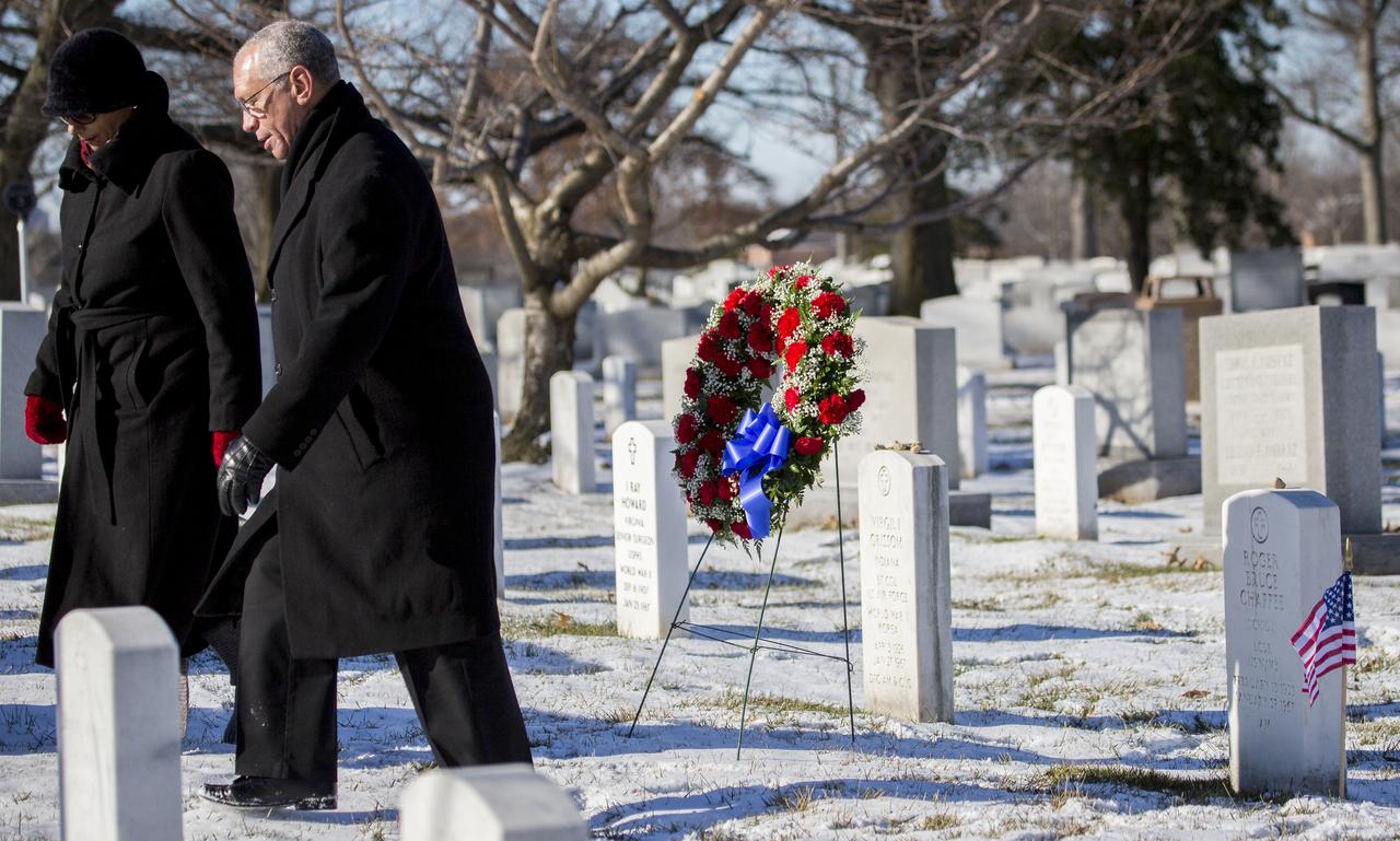 NASA Administrator Charles Bolden and his wife Alexis participate in a wreath laying ceremony at the graves of Apollo 1 crewmembers Virgil "Gus" Grissom and Roger Chaffee as part of NASA's Day of Remembrance, Wednesday, Jan. 28, 2015, at Arlington National Cemetery in Arlington, Va.  Wreaths were laid in memory of those men and women who lost their lives in the quest for space exploration.  Photo Credit: (NASA/Joel Kowsky)