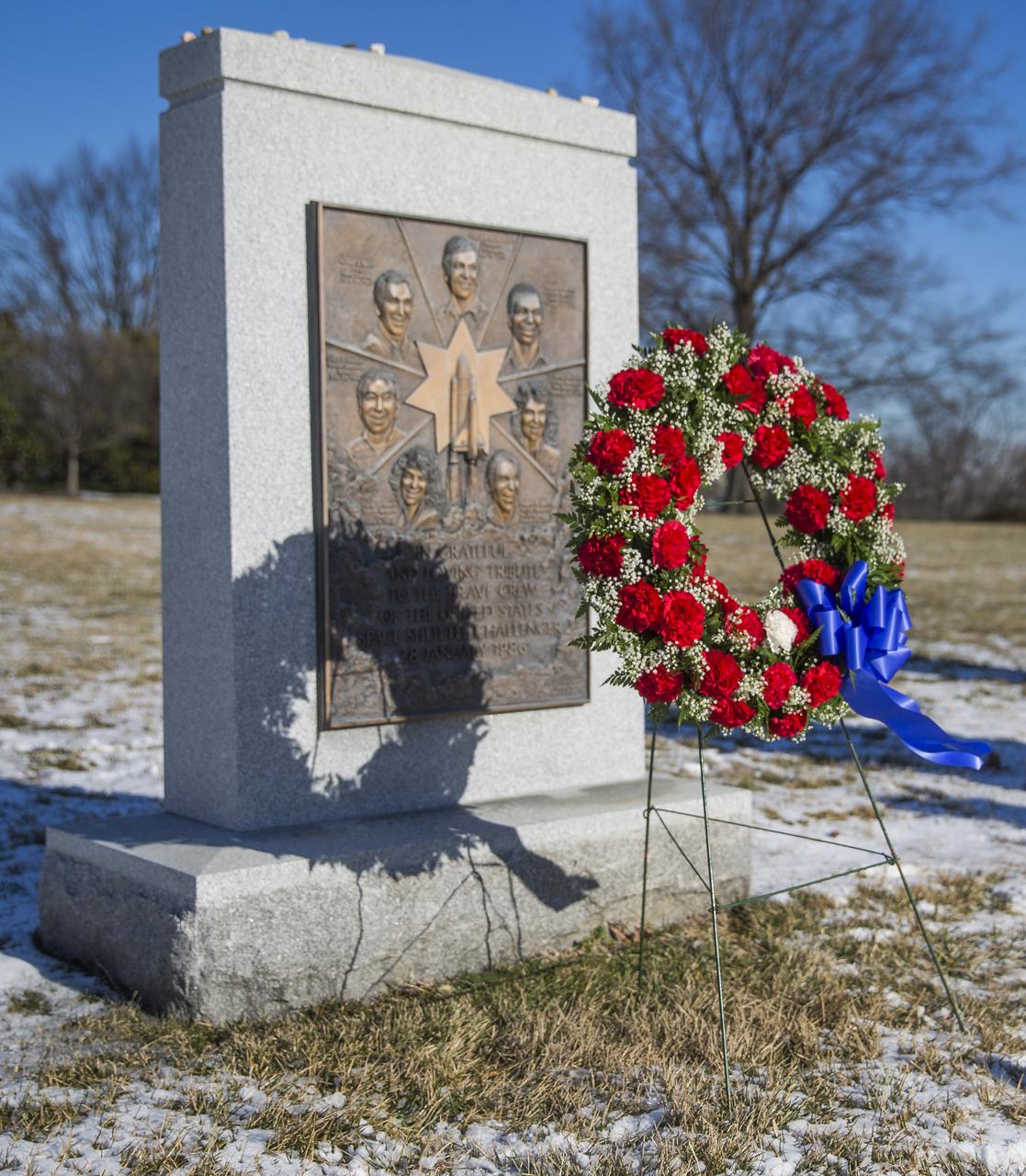 The Space Shuttle Challenger Memorial is seen after a wreath laying ceremony that was part of NASA's Day of Remembrance, Wednesday, Jan. 28, 2015, at Arlington National Cemetery in Arlington, Va.  The wreaths were laid in memory of those men and women who lost their lives in the quest for space exploration.  Photo Credit: (NASA/Joel Kowsky)