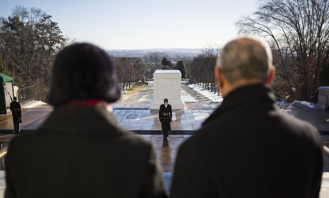 NASA Administrator Charles Bolden and his wife Alexis watch as Tomb guards with The Old Guard, the 3rd U.S. Infantry Regiment, perform a changing of the guard prior to a wreath-laying ceremony as part of NASA's Day of Remembrance, Wednesday, Jan. 28, 2015, at Arlington National Cemetery in Arlington, Va.  The wreaths were laid in memory of those men and women who lost their lives in the quest for space exploration.  Photo Credit: (NASA/Joel Kowsky)