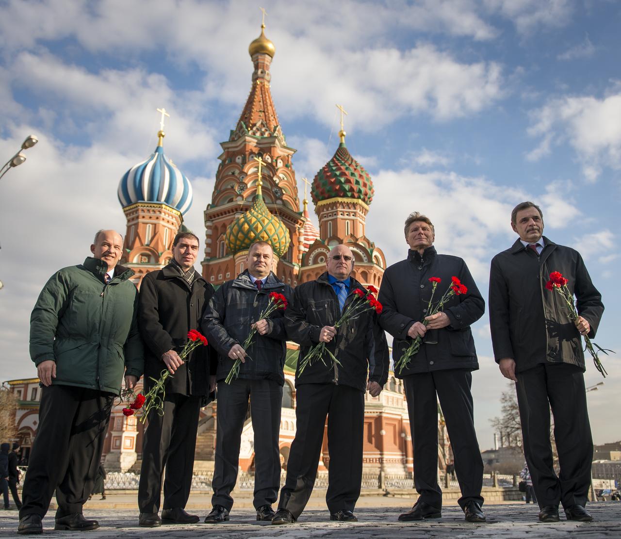 Expedition 43 prime and backup crews pose for a photograph together in front of St. Basil's Cathedral in Moscow as part of traditional pre-launch ceremonies, from left, Expedition 43 backup crew members; NASA Astronaut Jeff Williams, Russian cosmonaut Sergei Volkov of the Russian Federal Space Agency (Roscosmos), Russian cosmonaut Alexei Ovchinin of Roscosmos, Expedition 43 prime crew members; NASA Astronaut Scott Kelly, Russian cosmonaut Gennady Padalka of Roscosmos, and Russian cosmonaut Mikhail Kornienko of Roscosmos, Friday, March 6, 2015. Kelly, Padalka, and Kornienko are preparing for launch to the International Space Station in their Soyuz TMA-16M spacecraft from the Baikonur Cosmodrome in Kazakhstan March 28, Kazakh time. As the one-year crew, Kelly and Kornienko will return to Earth on Soyuz TMA-18M in March 2016. Photo Credit: (NASA/Bill Ingalls)