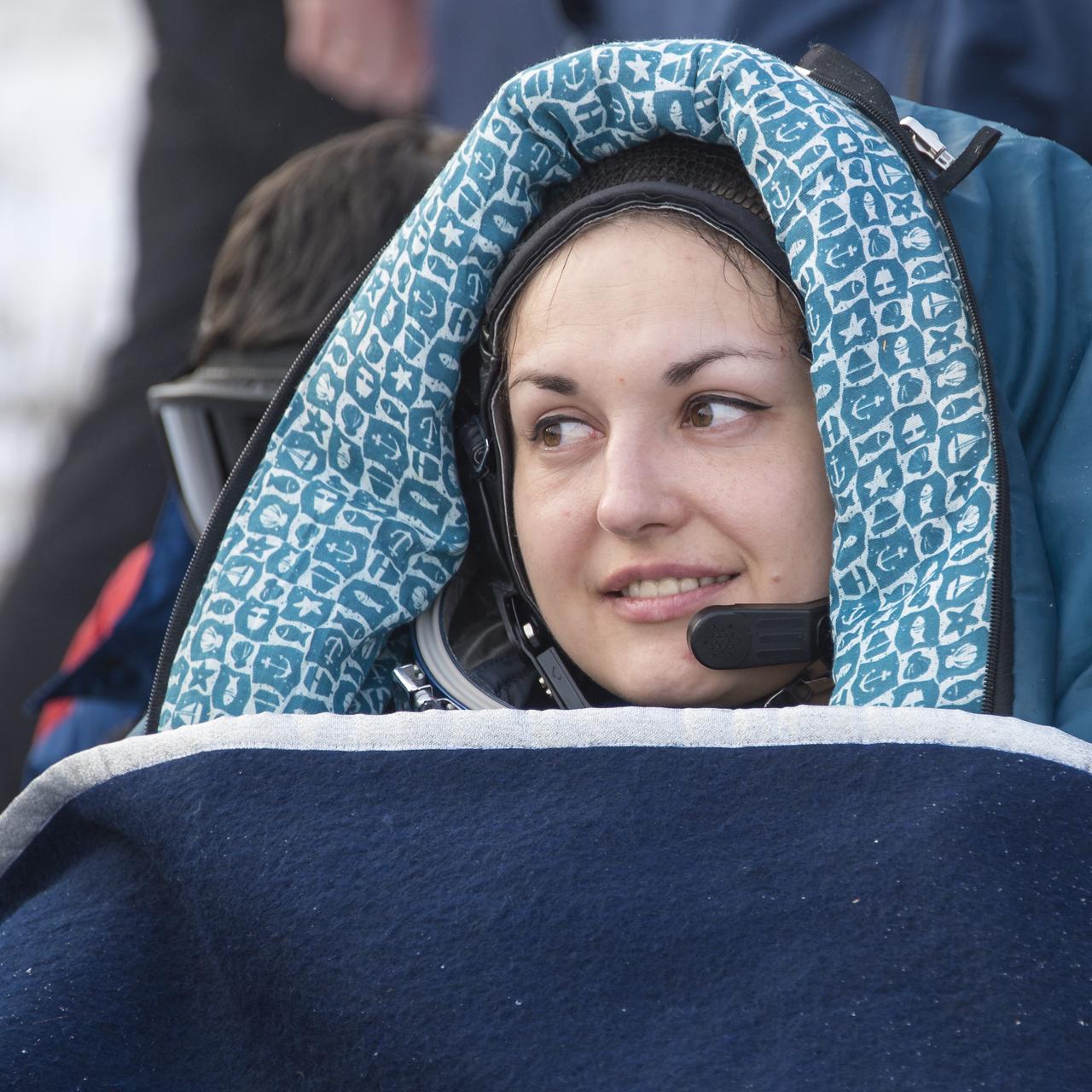 Expedition 42 Cosmonaut Elena Serova of the Russian Federal Space Agency (Roscosmos) rests in a chair outside the Soyuz TMA-14M spacecraft just minutes after she and NASA Astronaut Barry Wilmore of NASA, and Alexander Samokutyaev of Roscosmos landed in a remote area near the town of Zhezkazgan, Kazakhstan on Thursday, March 12, 2015. NASA Astronaut Wilmore, Russian Cosmonauts Samokutyaev and Serova are returning after almost six months onboard the International Space Station where they served as members of the Expedition 41 and 42 crews. Photo Credit: (NASA/Bill Ingalls)