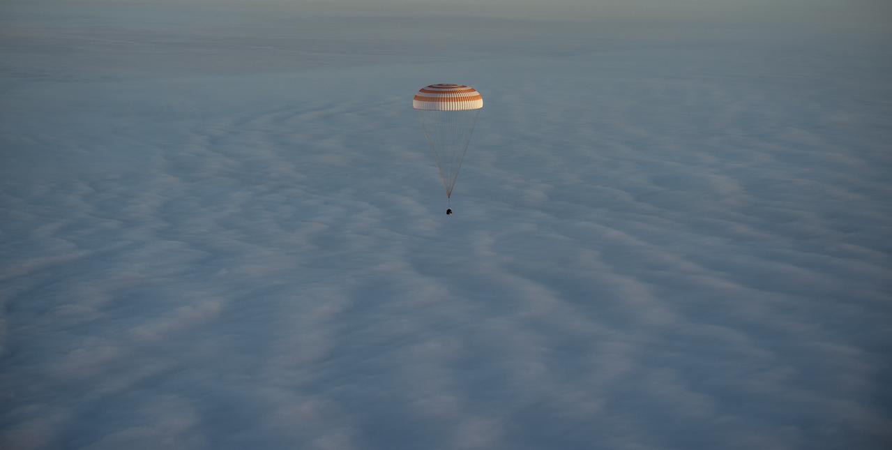 The Soyuz TMA-14M spacecraft is seen as it lands with Expedition 42 commander Barry Wilmore of NASA, Alexander Samokutyaev of the Russian Federal Space Agency (Roscosmos) and Elena Serova of Roscosmos near the town of Zhezkazgan, Kazakhstan on Thursday, March 12, 2015. NASA Astronaut Wilmore, Russian Cosmonauts Samokutyaev and Serova are returning after almost six months onboard the International Space Station where they served as members of the Expedition 41 and 42 crews. Photo Credit: (NASA/Bill Ingalls)
