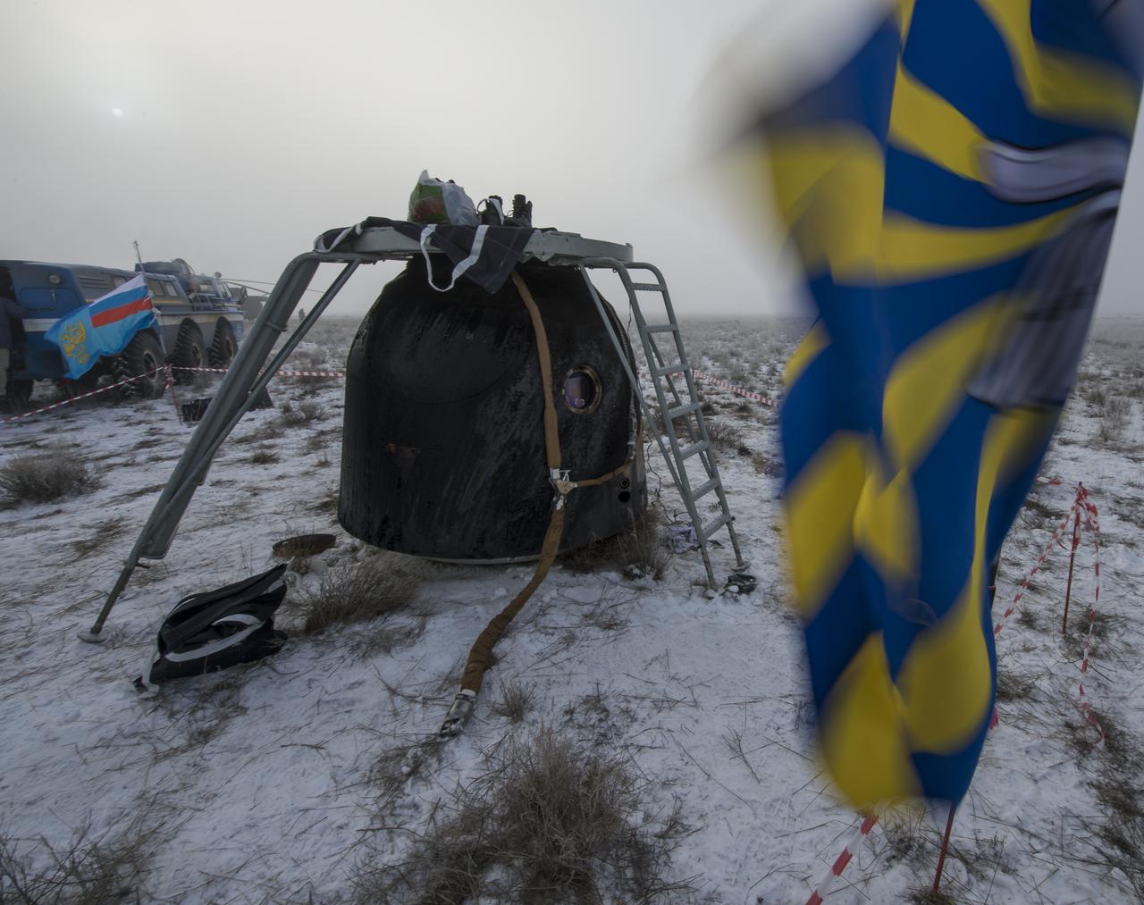 The Soyuz TMA-14M spacecraft is seen after it landed with Expedition 42 commander Barry Wilmore of NASA, Alexander Samokutyaev of the Russian Federal Space Agency (Roscosmos) and Elena Serova of Roscosmos near the town of Zhezkazgan, Kazakhstan on Thursday, March 12, 2015. NASA Astronaut Wilmore, Russian Cosmonauts Samokutyaev and Serova are returning after almost six months onboard the International Space Station where they served as members of the Expedition 41 and 42 crews. Photo Credit: (NASA/Bill Ingalls)