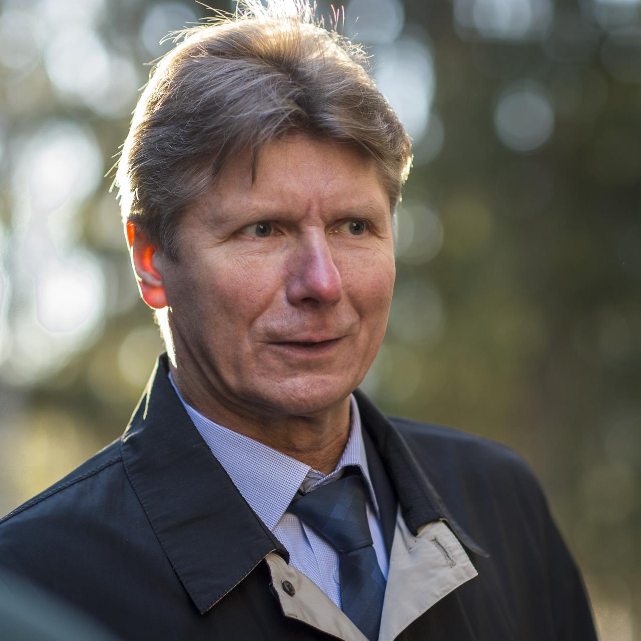 The Expedition 43 Cosmonaut Gennady Padalka of the Russian Federal Space Agency (Roscosmos), talks with friends and family as he waits for fellow crew mates, NASA Astronaut Scott Kelly, and, Russian Cosmonaut Mikhail Kornienko of Roscosmos, ahead of their departure from the Gagarin Cosmonaut Training Center (GCTC) in Star City, Russia for Baikonur, Kazakhstan, Saturday, March 14, 2015. The trio is preparing for launch to the International Space Station in their Soyuz TMA-16M spacecraft from the Baikonur Cosmodrome in Kazakhstan March 28, Kazakh time. As the one-year crew, Kelly and Kornienko will return to Earth on Soyuz TMA-18M in March 2016. Photo Credit: (NASA/Bill Ingalls)