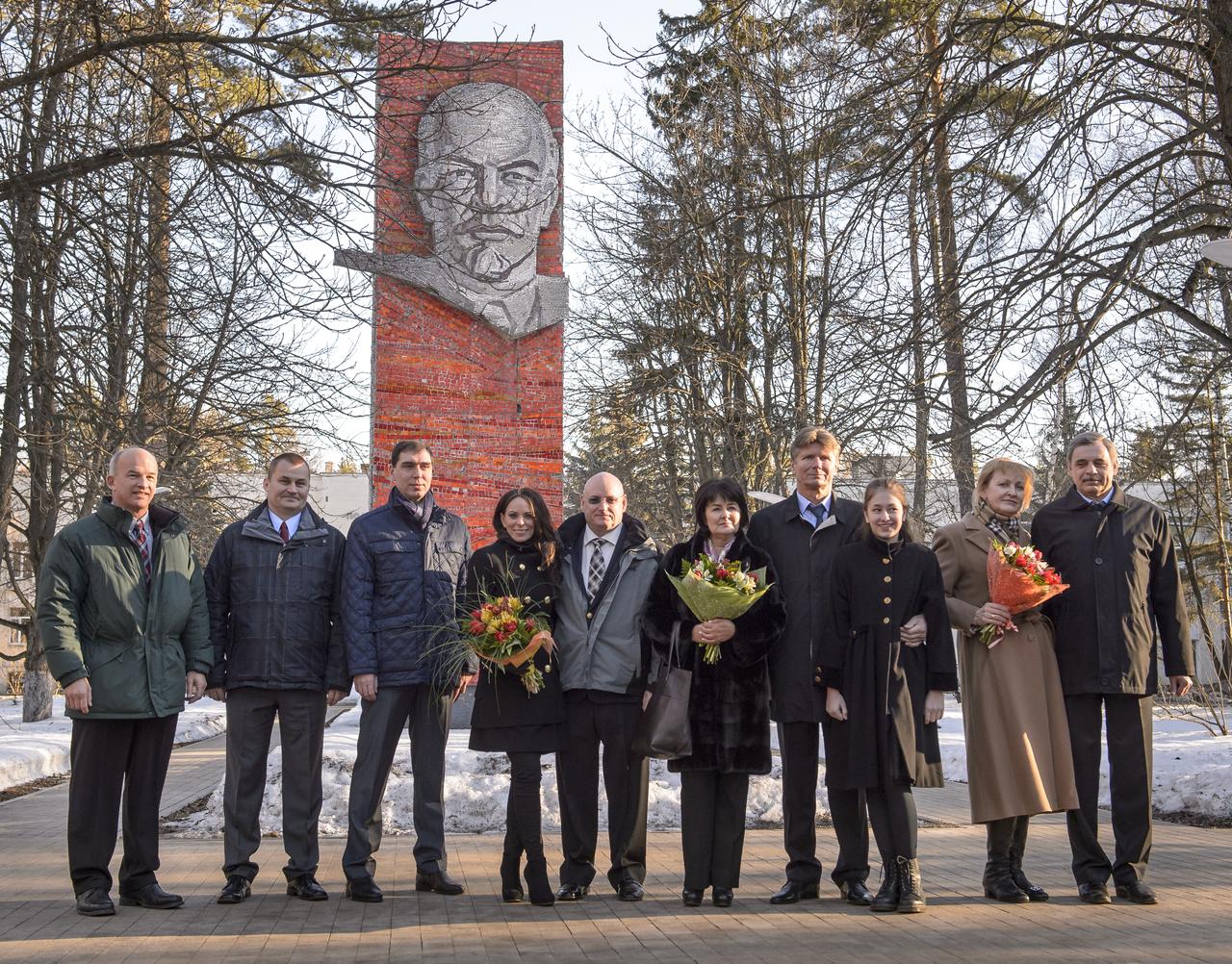 Expedition 43 backup crew members: Jeff Williams of NASA, left, Alexei Ovchinin and Sergei Volkov of of the Russian Federal Space Agency (Roscosmos), pose for a photograph with Expedition 43 prime crew members: NASA Astronaut Scott Kelly, and Russian Cosmonauts Gennady Padalka, and Mikhail Kornienko of Roscosmos, along with loved ones prior to departing the Gagarin Cosmonaut Training Center (GCTC) in Star City, Russia, for Baikonur, Kazakhstan, Saturday, March 14, 2015. The Expedition 43 crew is preparing for launch to the International Space Station in the Soyuz TMA-16M spacecraft from the Baikonur Cosmodrome in Kazakhstan March 28, Kazakh time. As the one-year crew, Kelly and Kornienko will return to Earth on Soyuz TMA-18M in March 2016. Photo Credit: (NASA/Bill Ingalls)