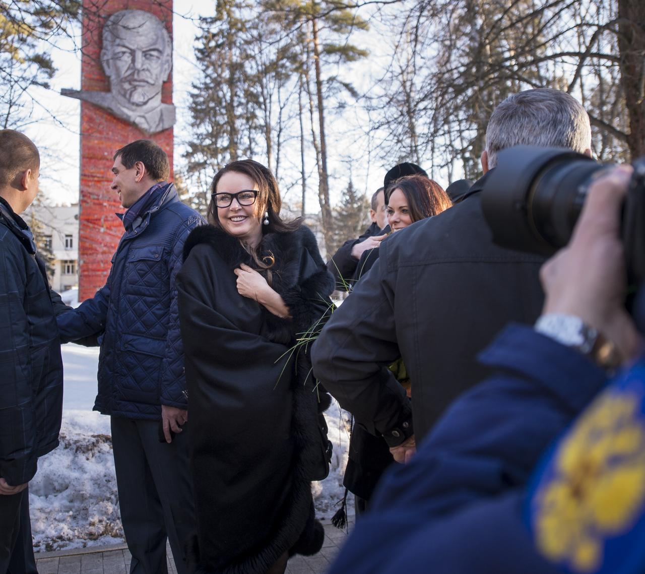 Soprano Singer Sarah Brightman, scheduled to fly to space later in 2015 as a space tourist, was on hand to wish Expedition 43 NASA Astronaut Scott Kelly, and Russian Cosmonauts Gennady Padalka, and Mikhail Kornienko of Roscosmos, farewell as the crew departed the Gagarin Cosmonaut Training Center (GCTC) in Star City, Russia, Saturday, March 14, 2015. The Expedition 43 trio is preparing for launch to the International Space Station in their Soyuz TMA-16M spacecraft from the Baikonur Cosmodrome in Kazakhstan March 28, Kazakh time. As the one-year crew, Kelly and Kornienko will return to Earth on Soyuz TMA-18M in March 2016. Photo Credit: (NASA/Bill Ingalls)