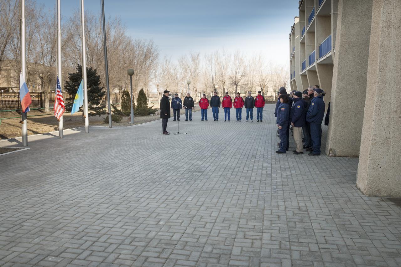 Expedition 43 prime crew: NASA Flight Engineer Scott Kelly, Russian Cosmonauts Gennady Padalka, and Mikhail Kornienko of the Russian Federal Space Agency (Roscosmos), along with their backup crew: Jeff Williams of NASA, Russian Cosmonauts Alexei Ovchinin, and Sergei Volkov of Roscosmos attend a traditional flag raising ceremony at the Cosmonaut Hotel, Monday, March 16, 2015 in Baikonur, Kazakhstan. Kelly, Padalka, and Kornienko are preparing for launch to the International Space Station in their Soyuz TMA-16M spacecraft from the Baikonur Cosmodrome in Kazakhstan March 28, Kazakh time. As the one-year crew, Kelly and Kornienko will return to Earth on Soyuz TMA-18M in March 2016. Photo Credit: (NASA/Victor Zelentsov)
