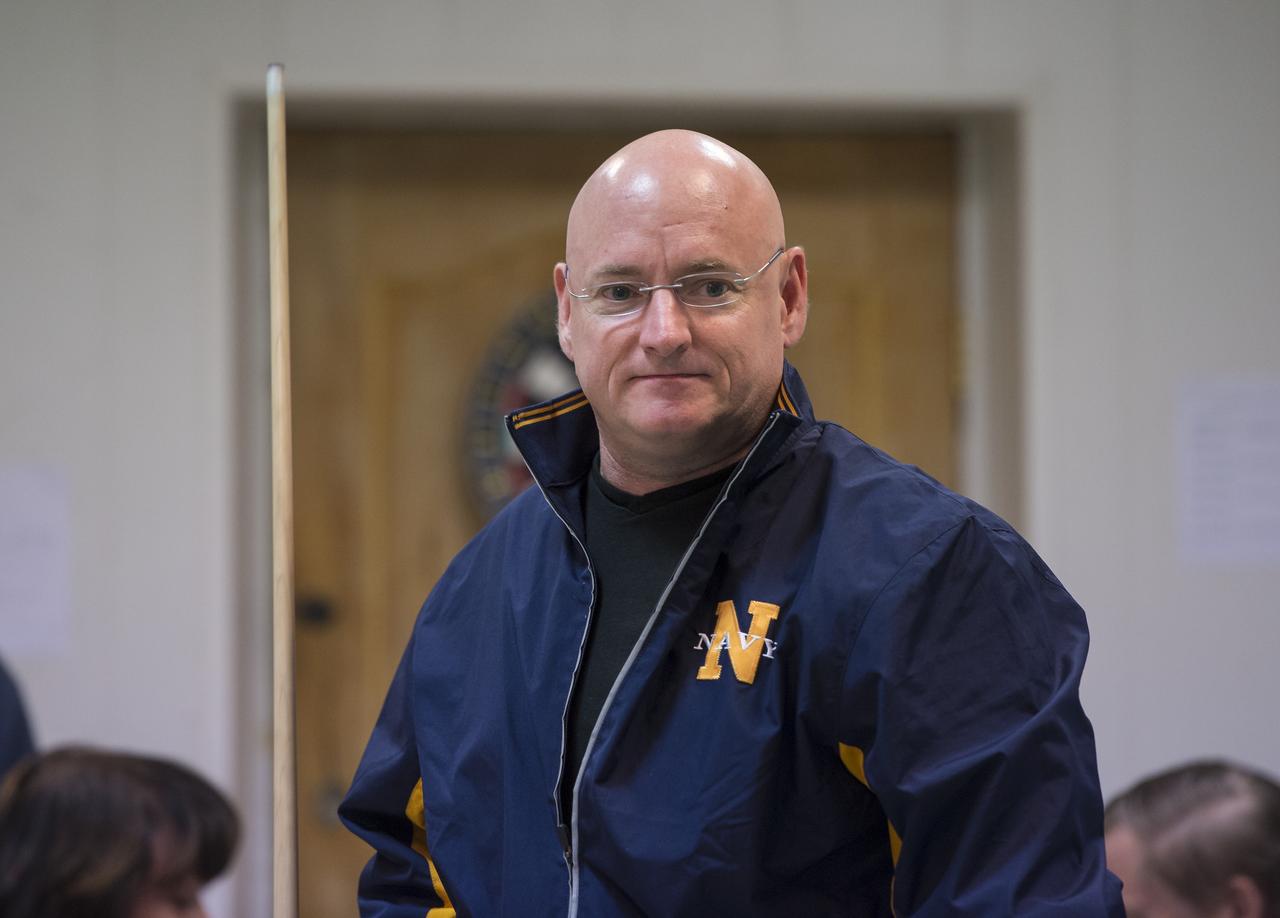 Expedition 43 NASA Astronaut Scott Kelly plays pool with Russian Cosmonaut Mikhail Kornienko of the Russian Federal Space Agency (Roscosmos) at the Cosmonaut Hotel, Thursday, March 19, 2015 in Baikonur, Kazakhstan. Kelly, Kornienko, and Russian Cosmonaut Gennady Padalka are preparing for launch to the International Space Station in their Soyuz TMA-16M spacecraft from the Baikonur Cosmodrome in Kazakhstan March 28, Kazakh time. As the one-year crew, Kelly and Kornienko will return to Earth on Soyuz TMA-18M in March 2016. Photo Credit: (NASA/Bill Ingalls)