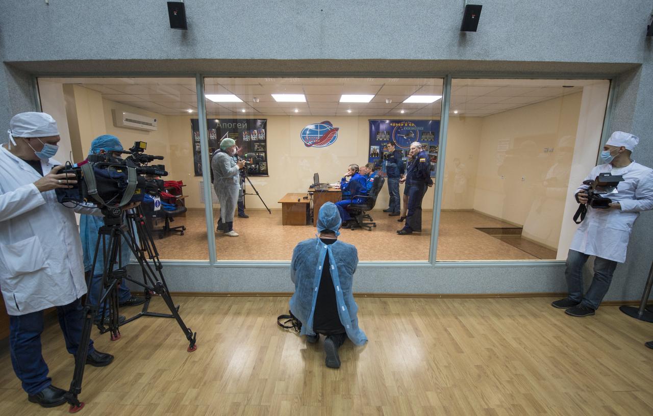 Media document Expedition 43 NASA Astronaut Scott Kelly, Russian Cosmonauts Gennady Padalka, and Mikhail Kornienko of the Russian Federal Space Agency (Roscosmos) as they work on Soyuz training, Saturday, March 21, 2015 at the Cosmonaut Hotel in Baikonur, Kazakhstan. Kelly, Padalka, and Kornienko are preparing for launch to the International Space Station in their Soyuz TMA-16M spacecraft from the Baikonur Cosmodrome in Kazakhstan March 28, Kazakh time (March 27 Eastern time.) As the one-year crew, Kelly and Kornienko will return to Earth on Soyuz TMA-18M in March 2016. Photo Credit: (NASA/Bill Ingalls)